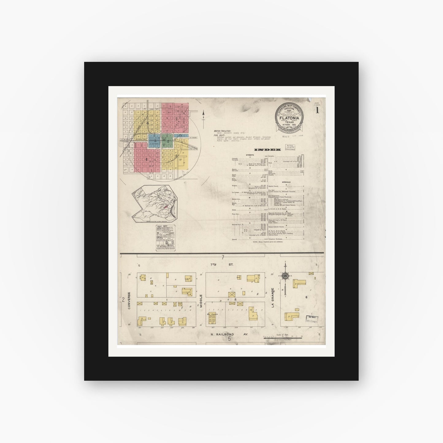 Old map wall art mockup — black gallery frame with white mat — Sanborn Fire Insurance Map from Flatonia, Fayette County, Texas (1922), Sheet #0001