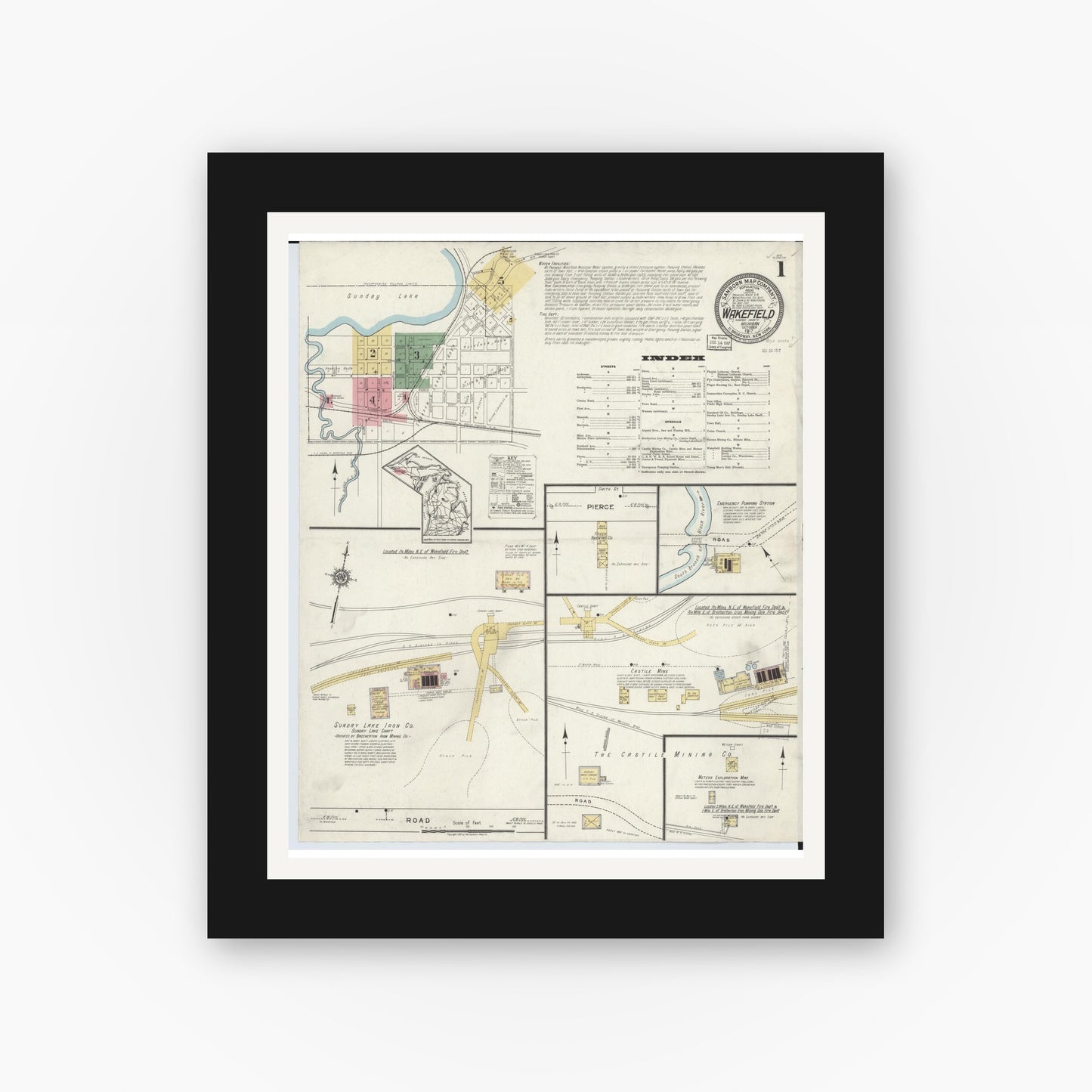 Old map wall art mockup — black gallery frame with white mat — Sanborn Fire Insurance Map from Wakefield, Gogebic County, Michigan (1917), Sheet #0001