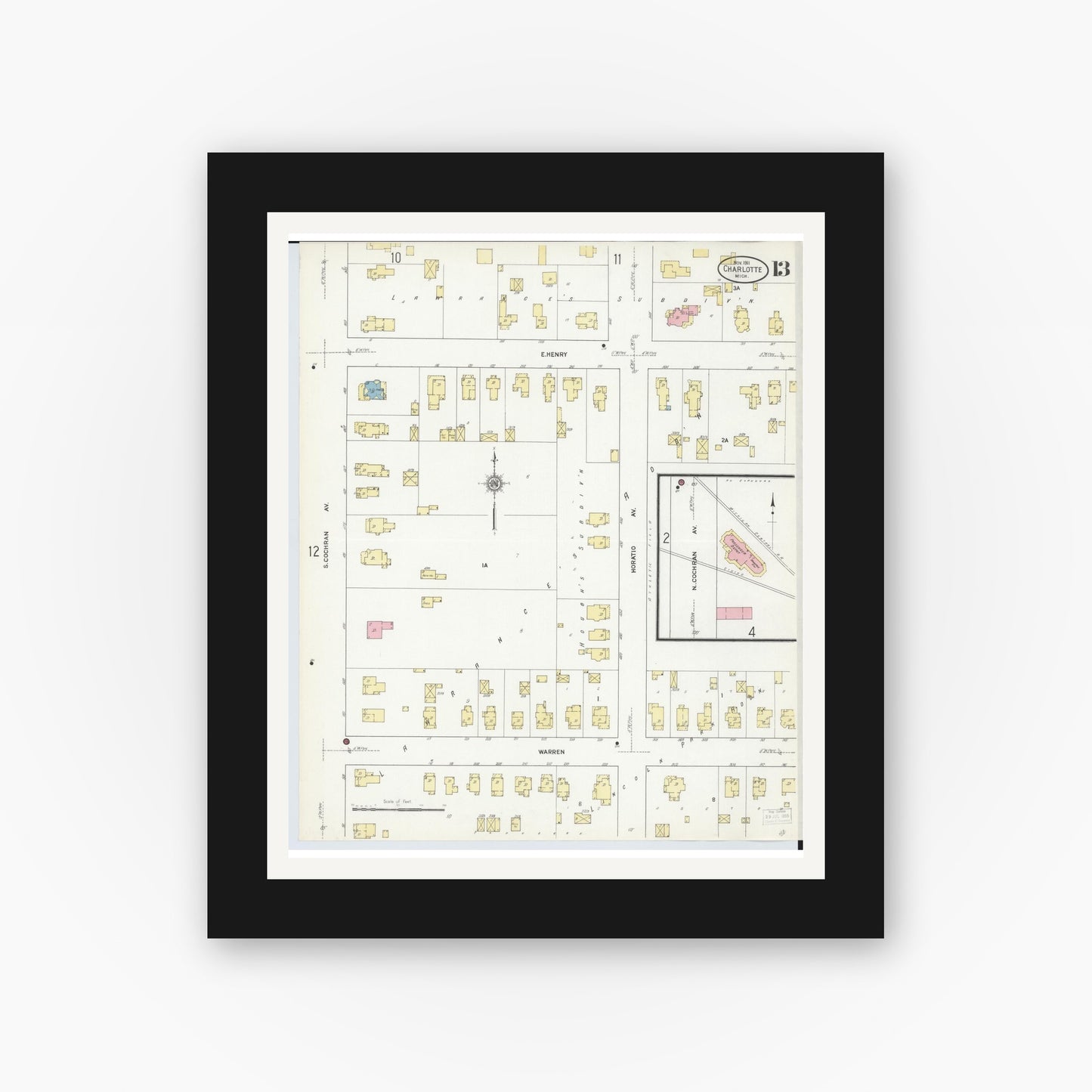 Old map wall art mockup — black gallery frame with white mat — Sanborn Fire Insurance Map from Charlotte, Eaton County, Michigan (1911), Sheet #0013