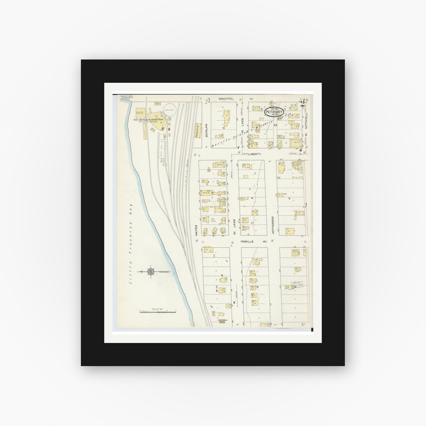 Old map wall art mockup — black gallery frame with white mat — Sanborn Fire Insurance Map from Petoskey, Emmet County, Michigan (1913), Sheet #0002