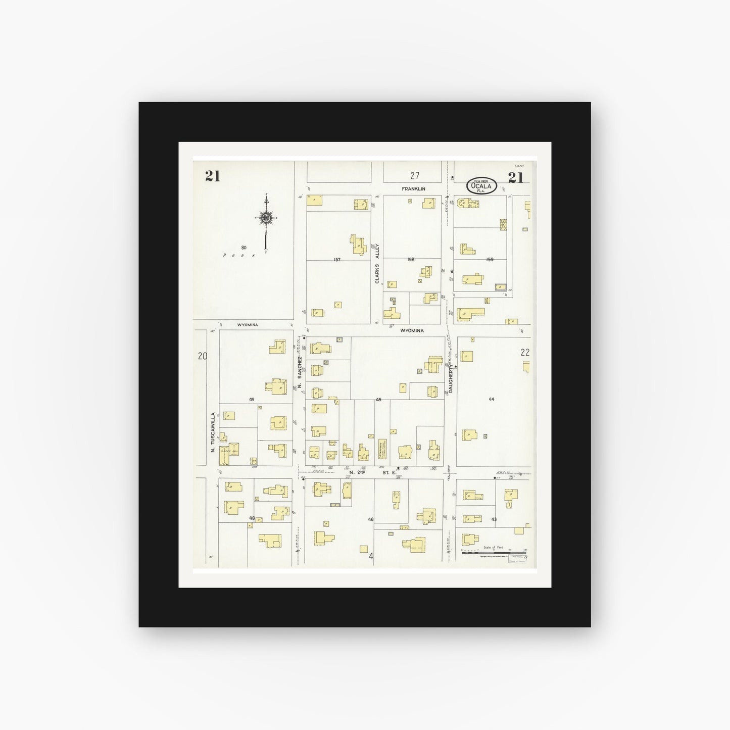 Old map wall art mockup — black gallery frame with white mat — Sanborn Fire Insurance Map from Ocala, Marion County, Florida (1924), Sheet #0021