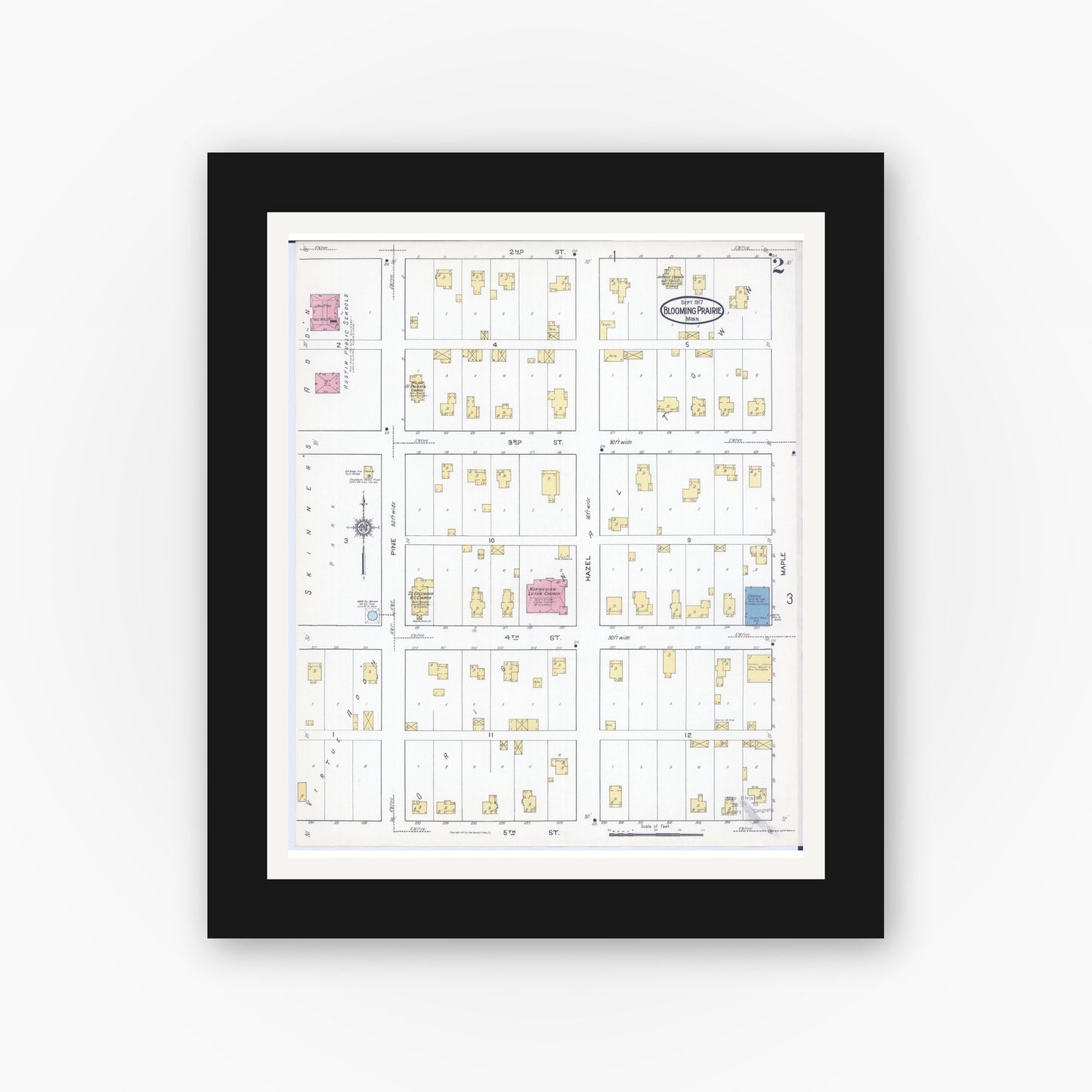 Old map wall art mockup — black gallery frame with white mat — Sanborn Fire Insurance Map from Blooming Prairie, Steele County, Minnesota (1917), Sheet #0002