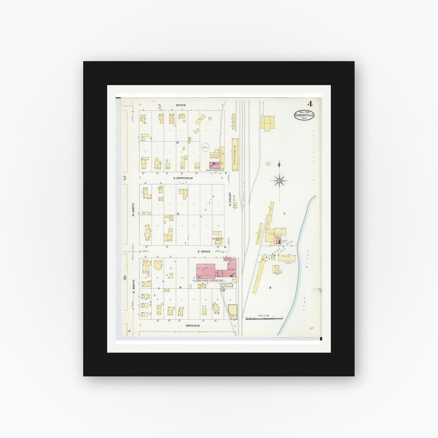 Old map wall art mockup — black gallery frame with white mat — Sanborn Fire Insurance Map from Greenville, Montcalm County, Michigan (1908), Sheet #0004