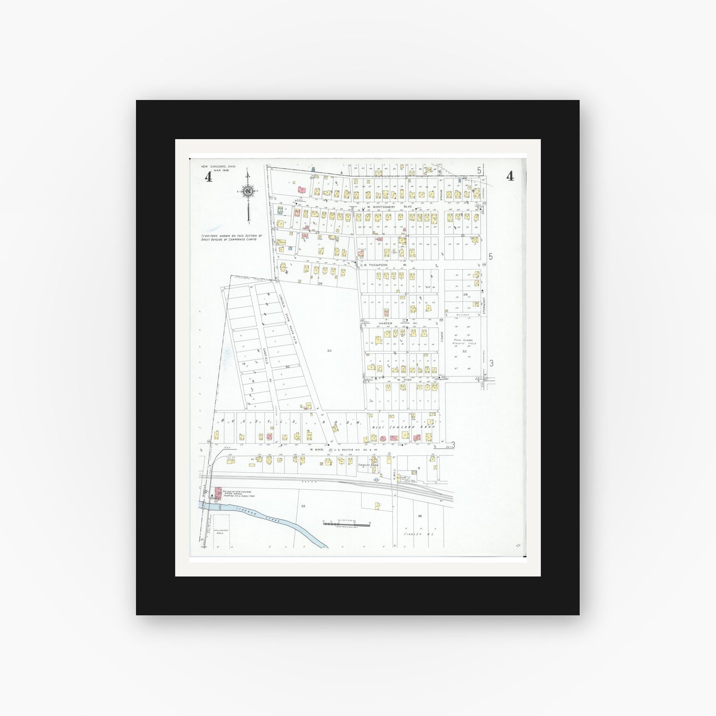 Old map wall art mockup — black gallery frame with white mat — Sanborn Fire Insurance Map from New Concord, Muskingum County, Ohio (1946), Sheet #0004