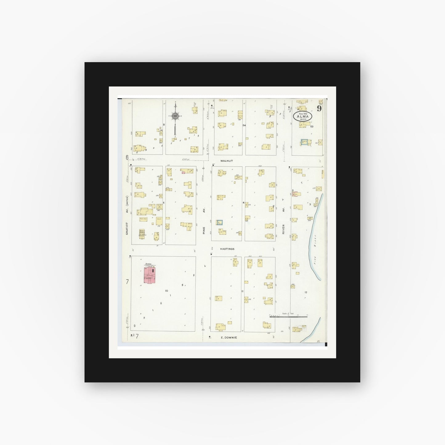 Old map wall art mockup — black gallery frame with white mat — Sanborn Fire Insurance Map from Alma, Gratiot County, Michigan (1910), Sheet #0009