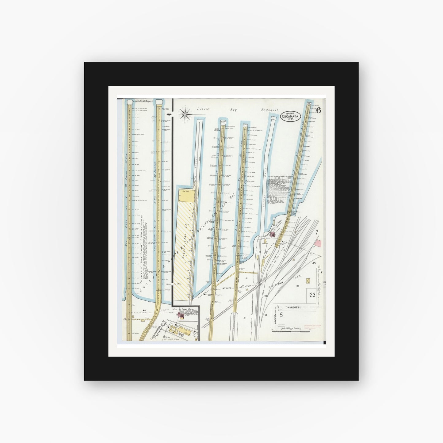 Old map wall art mockup — black gallery frame with white mat — Sanborn Fire Insurance Map from Escanaba, Delta County, Michigan (1906), Sheet #0006