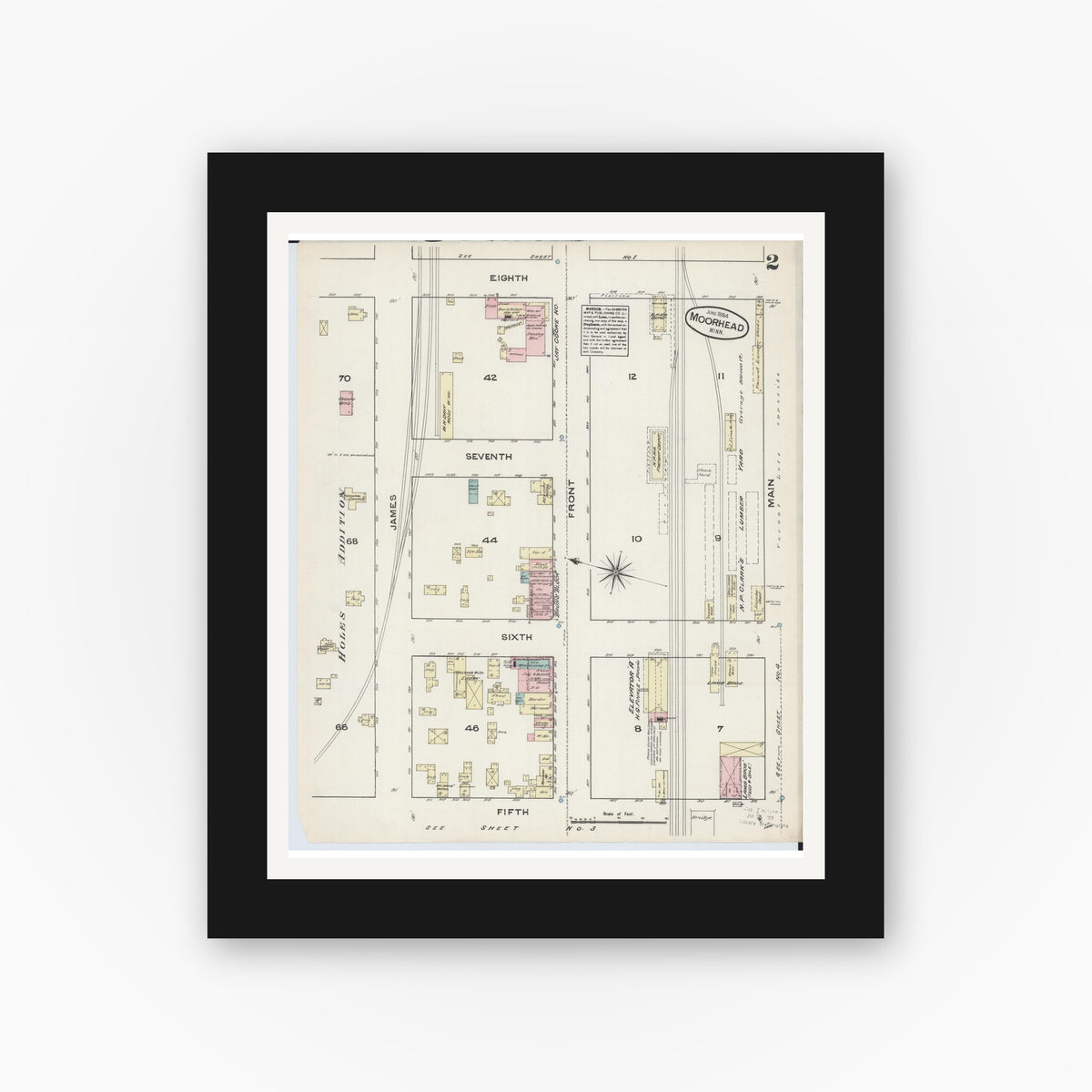 Old map wall art mockup — black gallery frame with white mat — Sanborn Fire Insurance Map from Moorhead, Clay County, Minnesota (1884), Sheet #0002