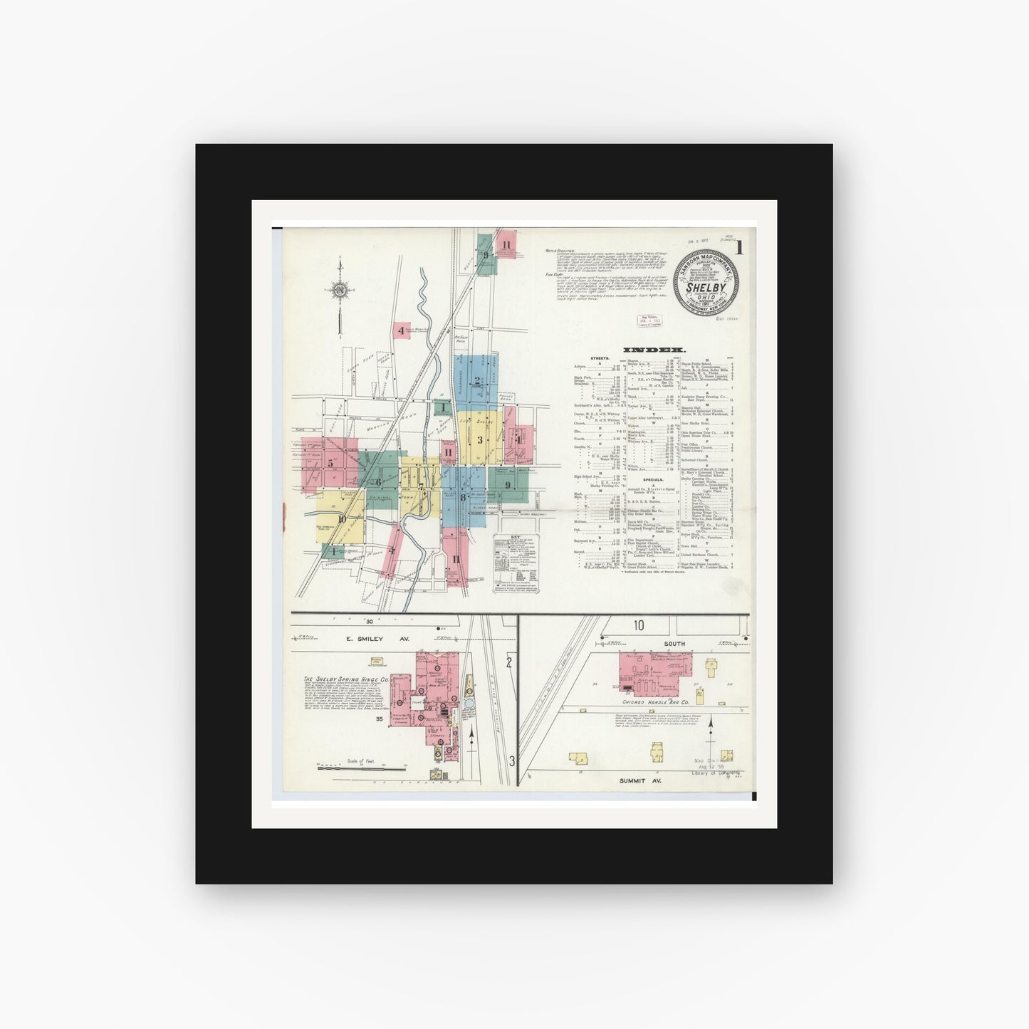 Old map wall art mockup — black gallery frame with white mat — Sanborn Fire Insurance Map from Shelby, Richland County, Ohio (1911), Sheet #0001