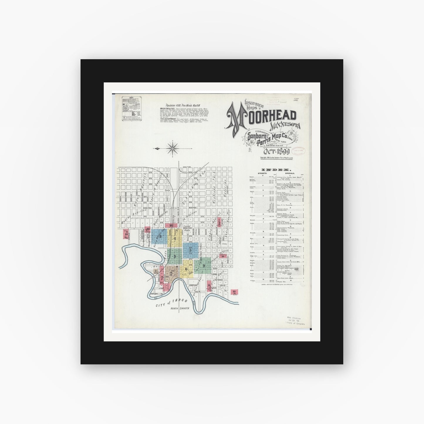 Old map wall art mockup — black gallery frame with white mat — Sanborn Fire Insurance Map from Moorhead, Clay County, Minnesota (1899), Sheet #0001