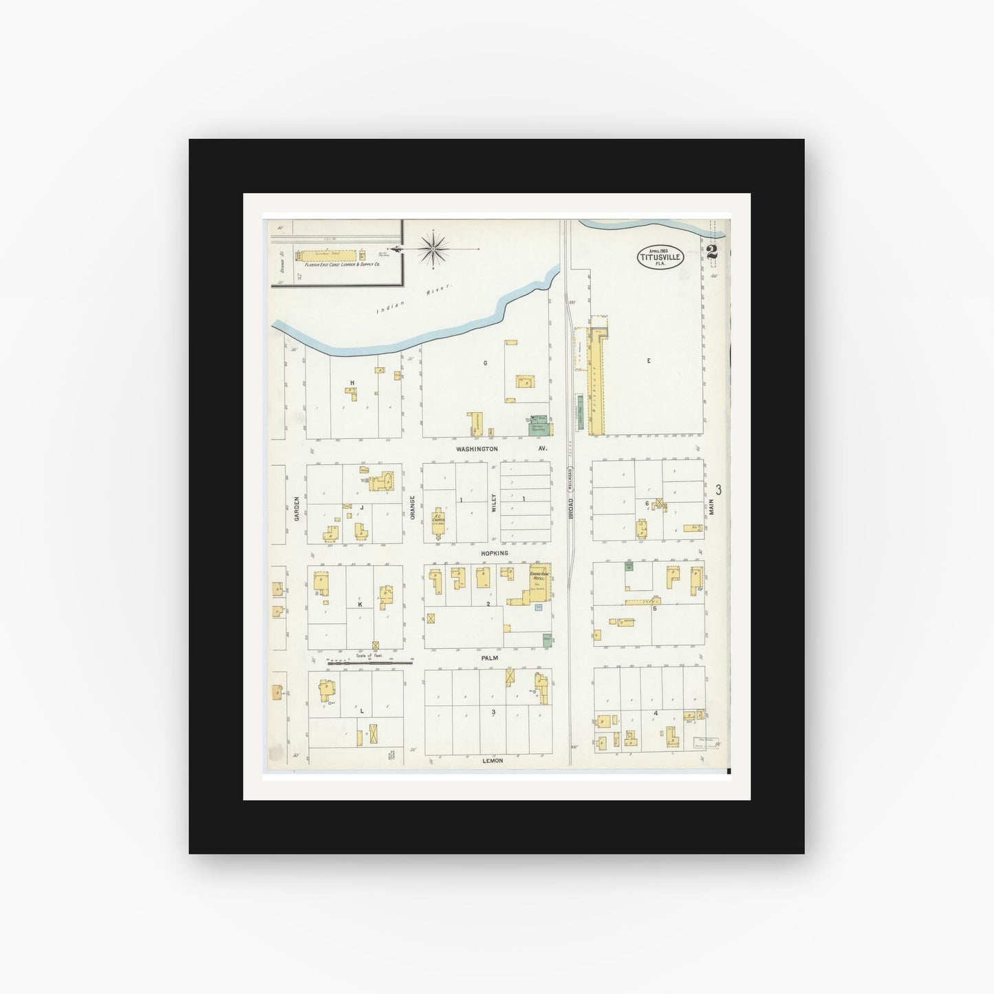 Old map wall art mockup — black gallery frame with white mat — Sanborn Fire Insurance Map from Titusville, Brevard County, Florida (1903), Sheet #0002