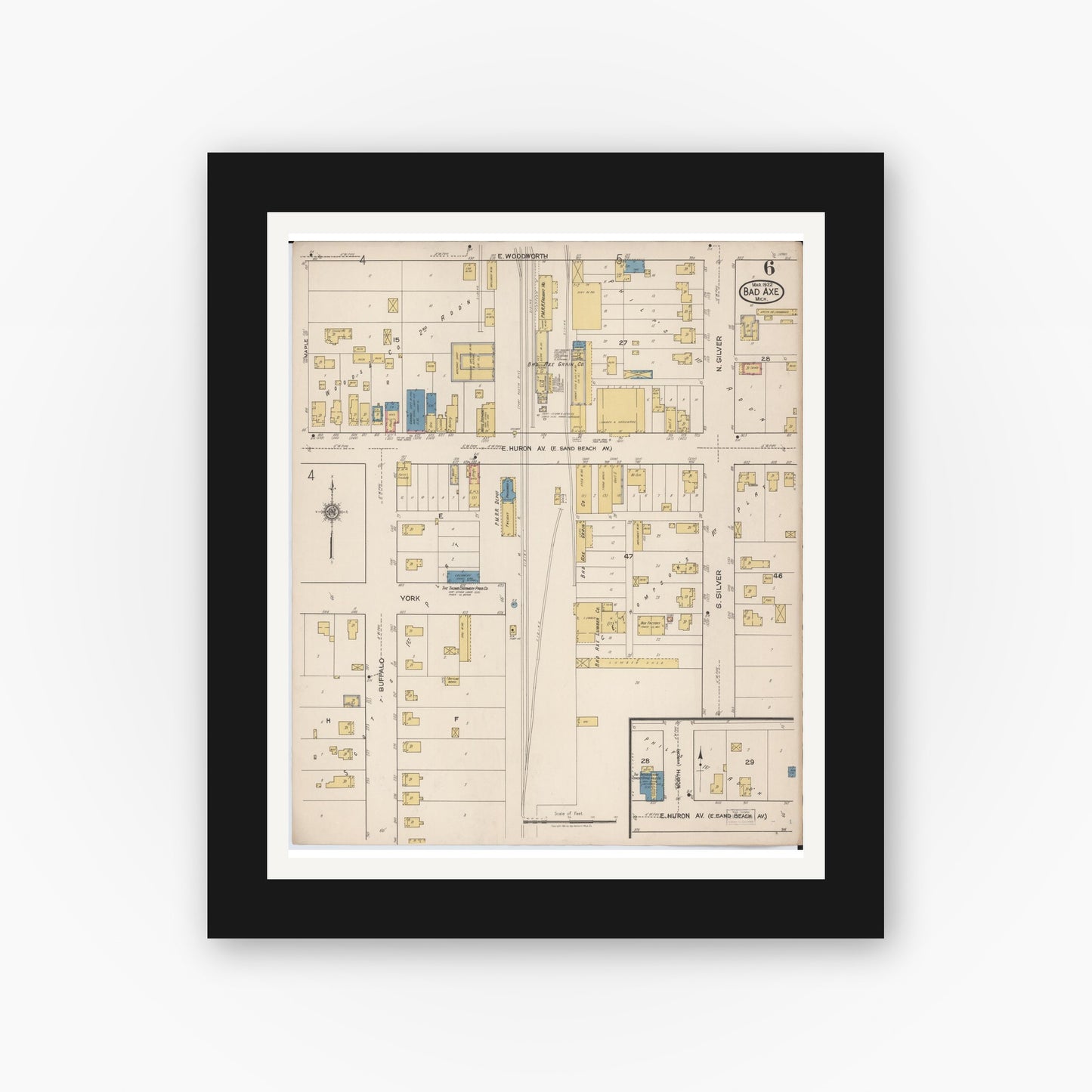 Old map wall art mockup — black gallery frame with white mat — Sanborn Fire Insurance Map from Bad Axe, Huron County, Michigan (1922), Sheet #0006