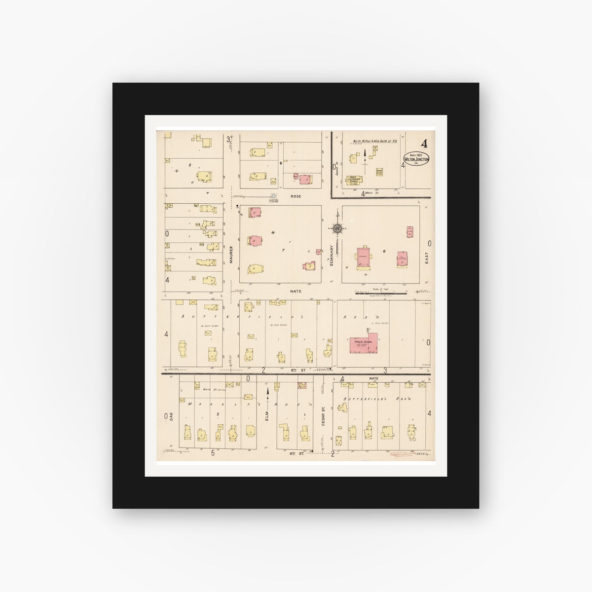 Old map wall art mockup — black gallery frame with white mat — Sanborn Fire Insurance Map from Wilton Junction, Muscatine County, Iowa (1922), Sheet #0004