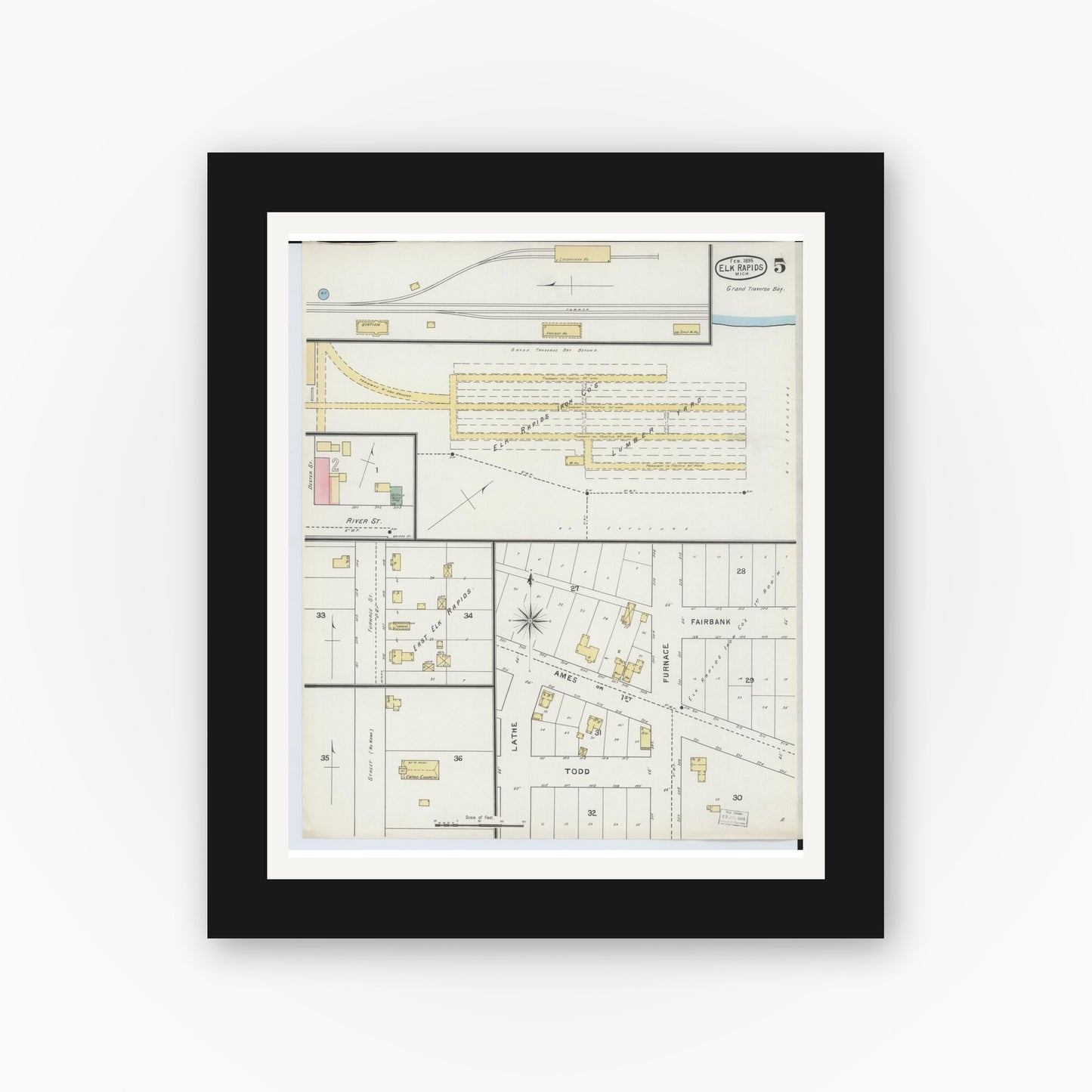 Old map wall art mockup — black gallery frame with white mat — Sanborn Fire Insurance Map from Elk Rapids, Antrim County, Michigan (1895), Sheet #0005
