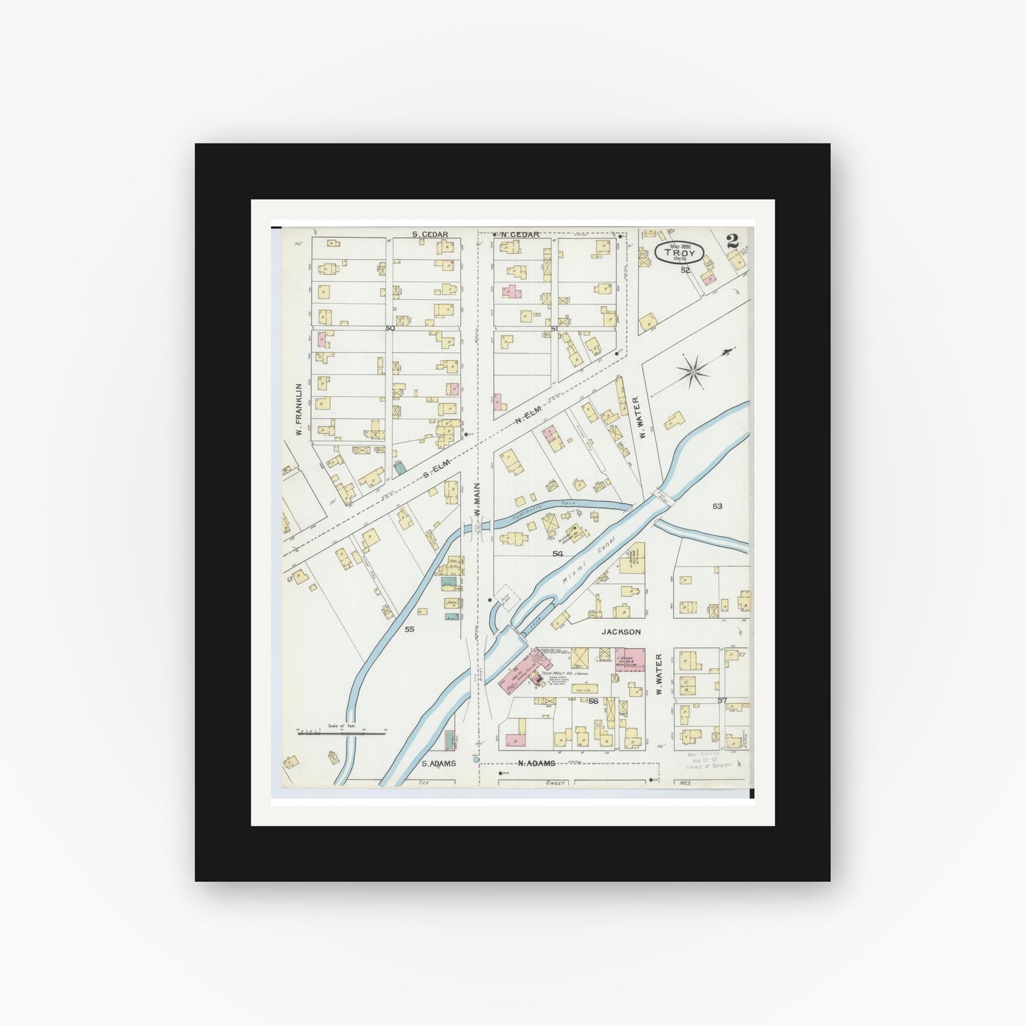 Old map wall art mockup — black gallery frame with white mat — Sanborn Fire Insurance Map from Troy, Miami County, Ohio (1892), Sheet #0002