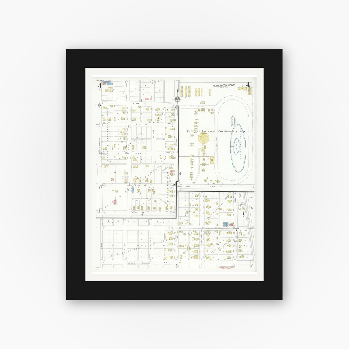 Old map wall art mockup — black gallery frame with white mat — Sanborn Fire Insurance Map from Shelbyville, Shelby County, Illinois (1933), Sheet #0004