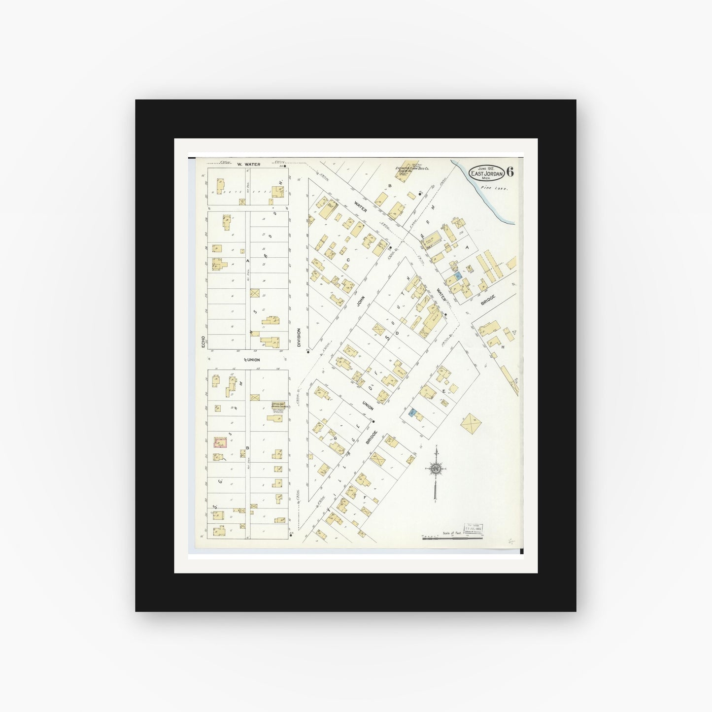Old map wall art mockup — black gallery frame with white mat — Sanborn Fire Insurance Map from East Jordan, Charlevoix County, Michigan (1912), Sheet #0006