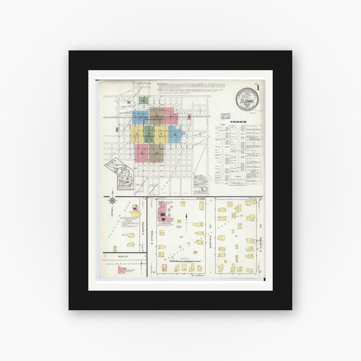 Old map wall art mockup — black gallery frame with white mat — Sanborn Fire Insurance Map from Saint Johns, Clinton County, Michigan (1918) - Complete Map Set