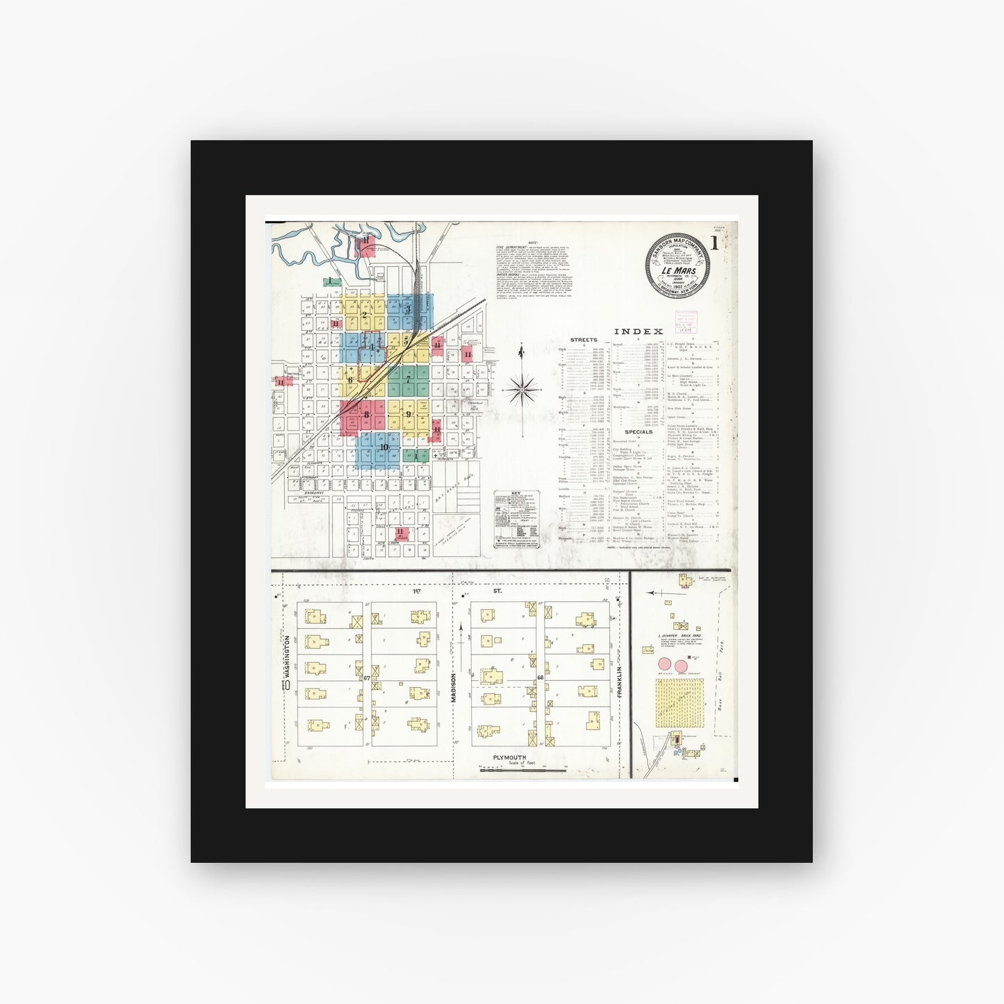 Old map wall art mockup — black gallery frame with white mat — Sanborn Fire Insurance Map from Le Mars, Plymouth County, Iowa (1907) — Complete Set