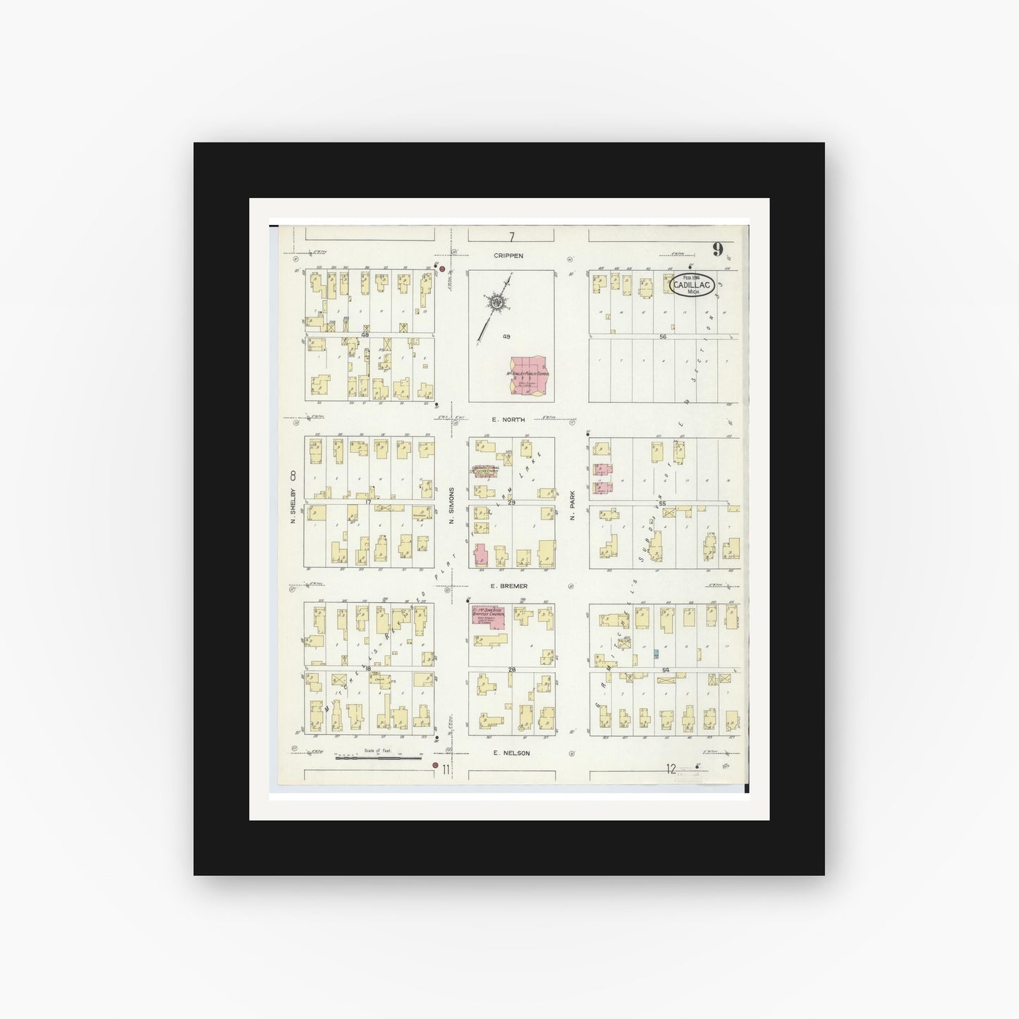 Old map wall art mockup — black gallery frame with white mat — Sanborn Fire Insurance Map from Cadillac, Wexford County, Michigan (1914), Sheet #0009