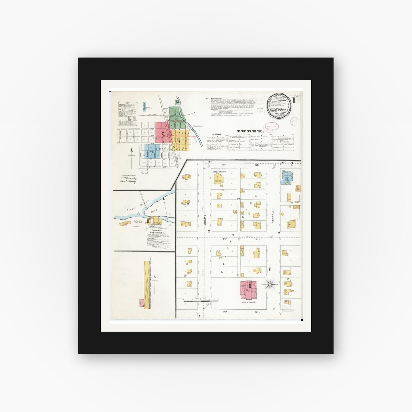 Old map wall art mockup — black gallery frame with white mat — Sanborn Fire Insurance Map from Rock Rapids, Lyon County, Iowa (1899) — Complete Set