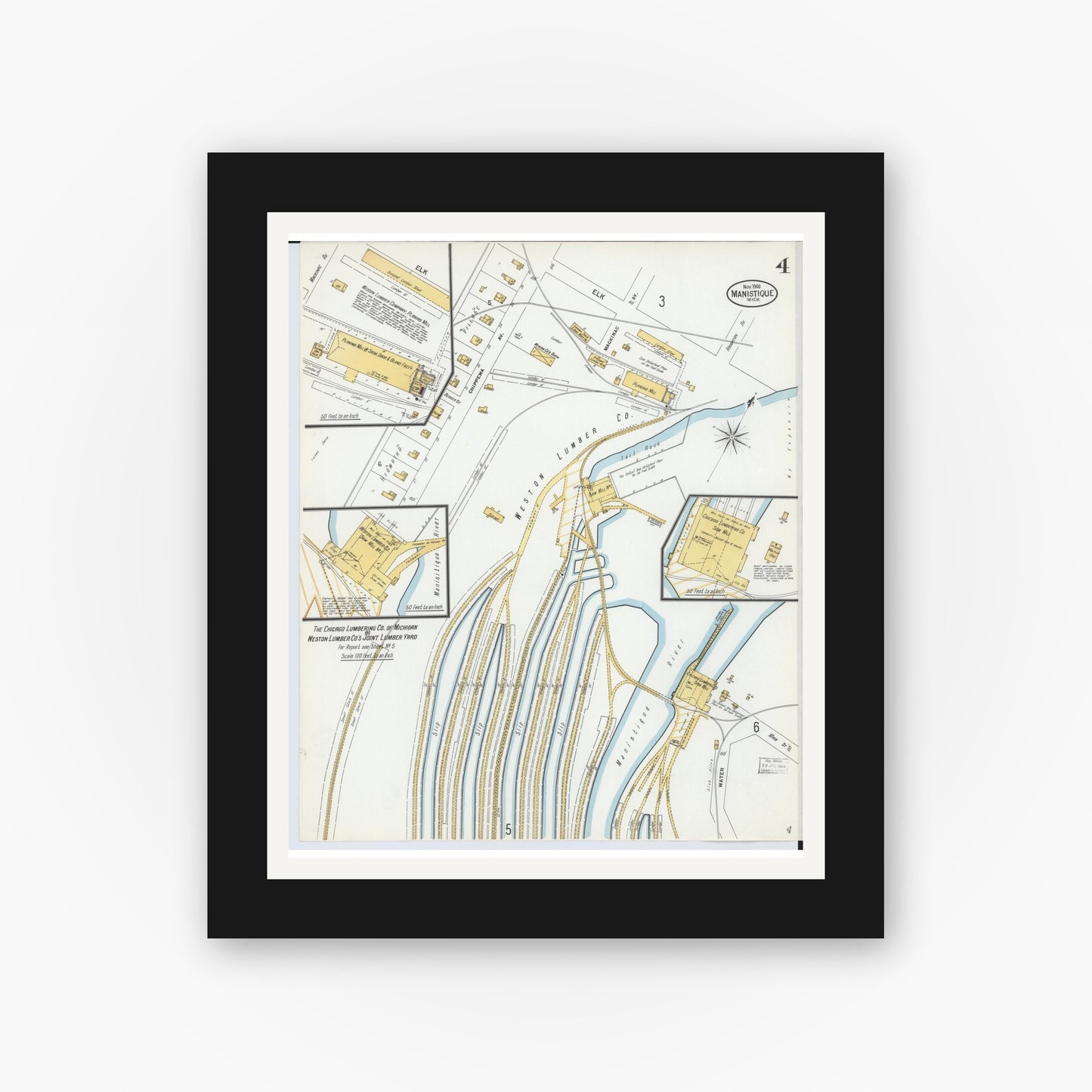 Old map wall art mockup — black gallery frame with white mat — Sanborn Fire Insurance Map from Manistique, Schoolcraft County, Michigan (1900), Sheet #0004