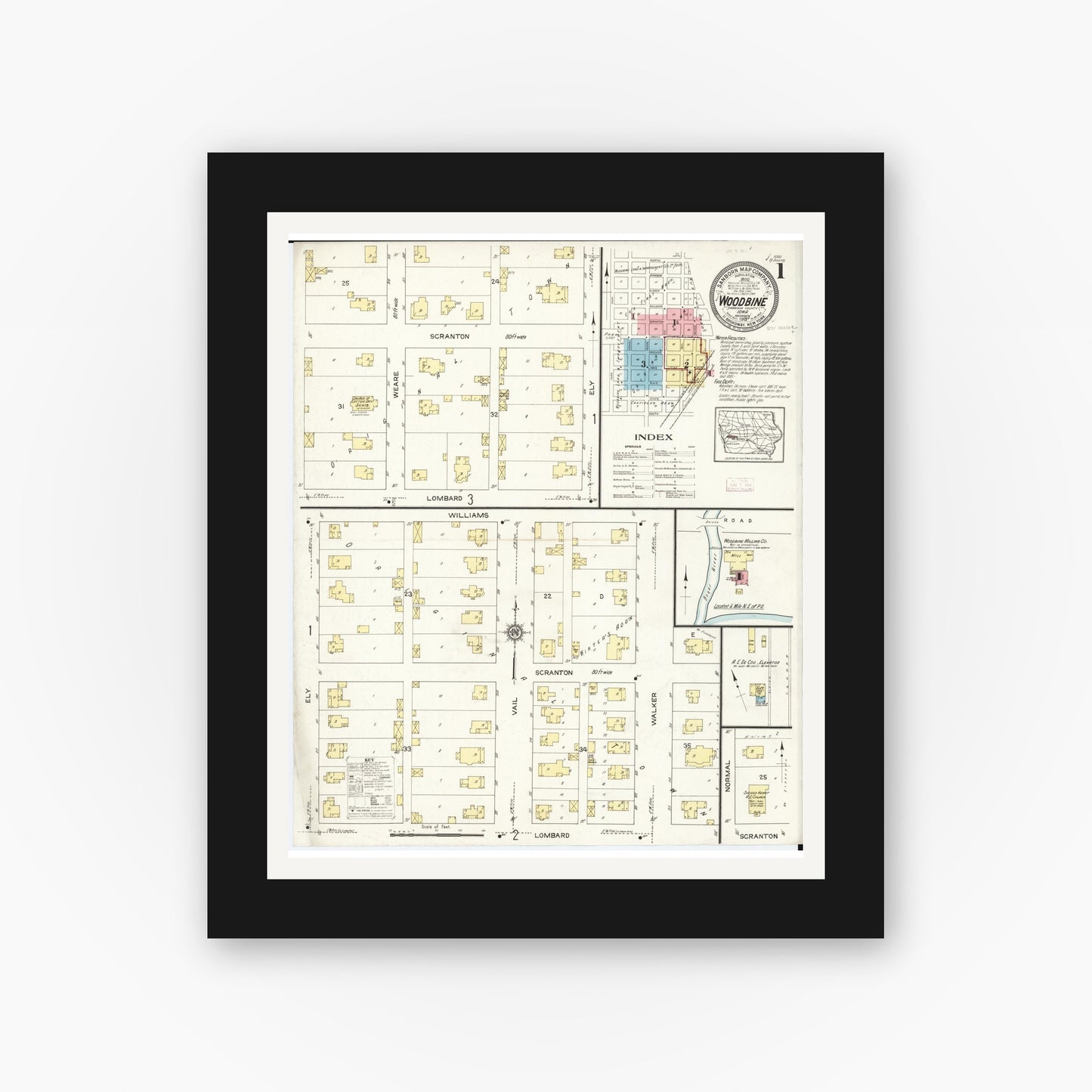 Old map wall art mockup — black gallery frame with white mat — Sanborn Fire Insurance Map from Woodbine, Harrison County, Iowa (1913), Sheet #0001