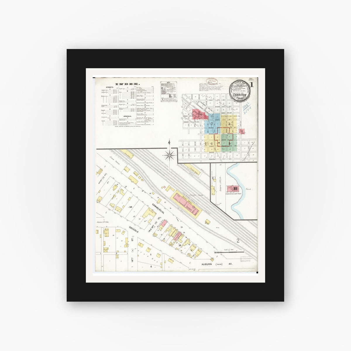 Old map wall art mockup — black gallery frame with white mat — Sanborn Fire Insurance Map from Chariton, Lucas County, Iowa (1899) — Complete Set