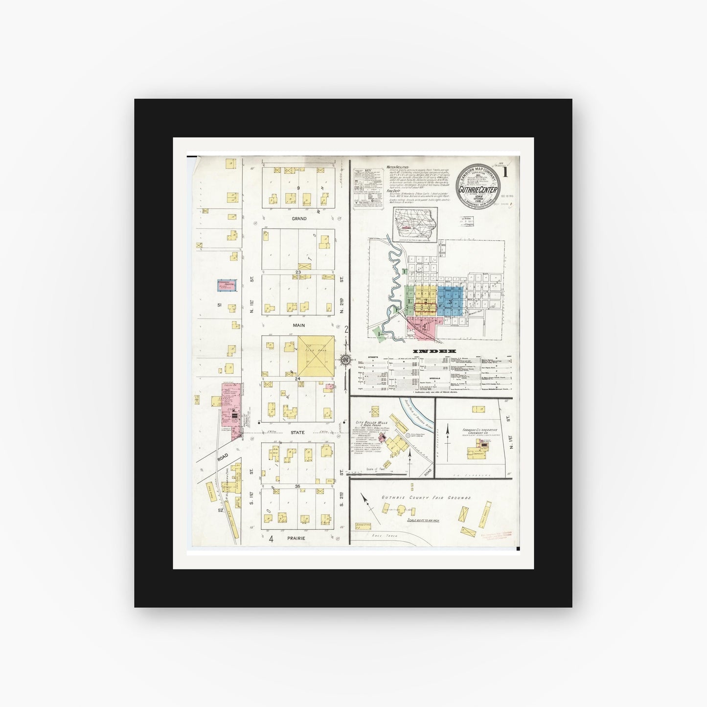 Old map wall art mockup — black gallery frame with white mat — Sanborn Fire Insurance Map from Guthrie Center, Guthrie County, Iowa (1916) — Complete Set
