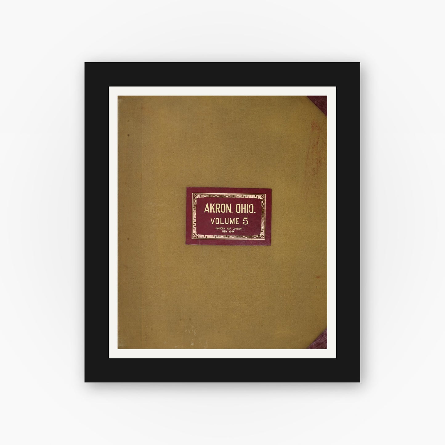 Old map wall art mockup — black gallery frame with white mat — Sanborn Fire Insurance Map from Akron, Summit County, Ohio (1951), Sheet #0001