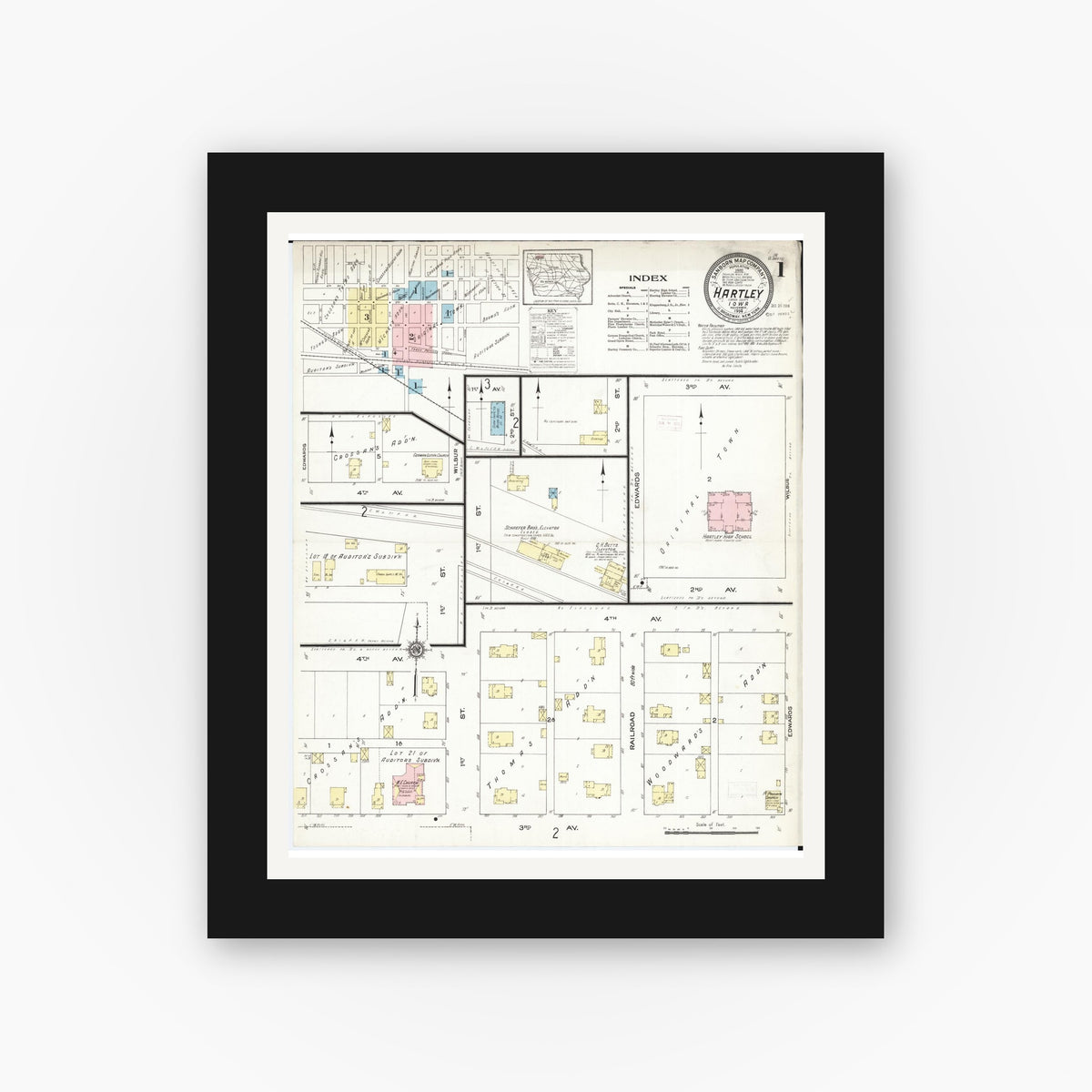 Old map wall art mockup — black gallery frame with white mat — Sanborn Fire Insurance Map from Hartley, O'Brien County, Iowa (1914), Sheet #0001