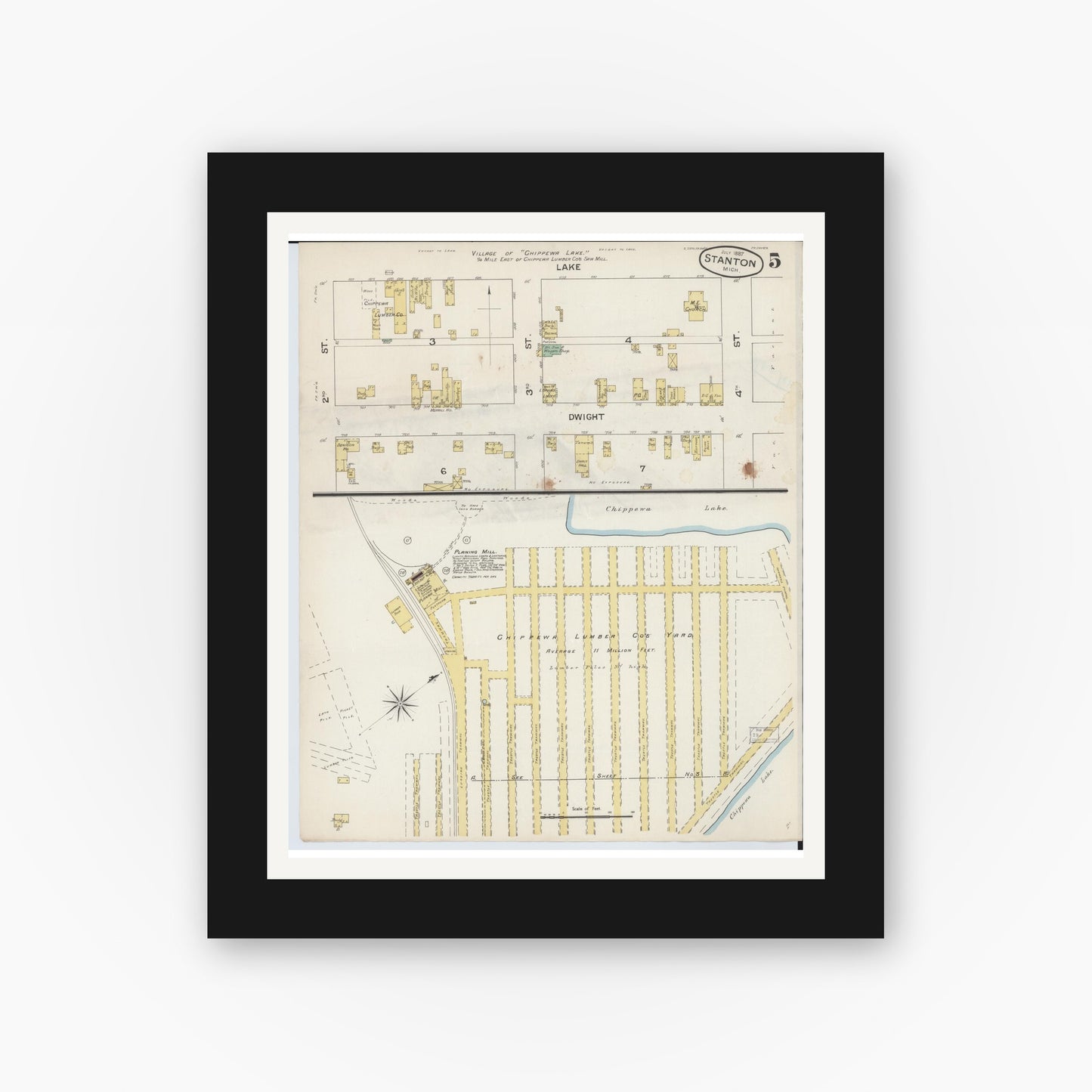 Old map wall art mockup — black gallery frame with white mat — Sanborn Fire Insurance Map from Stanton, Montcalm County, Michigan (1887), Sheet #0005