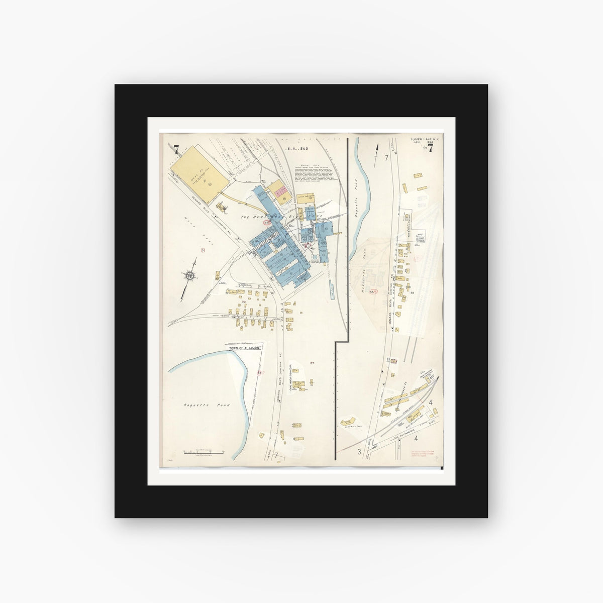 Old map wall art mockup — black gallery frame with white mat — Sanborn Fire Insurance Map from Tupper Lake, Franklin County, New York (1950), Sheet #0007