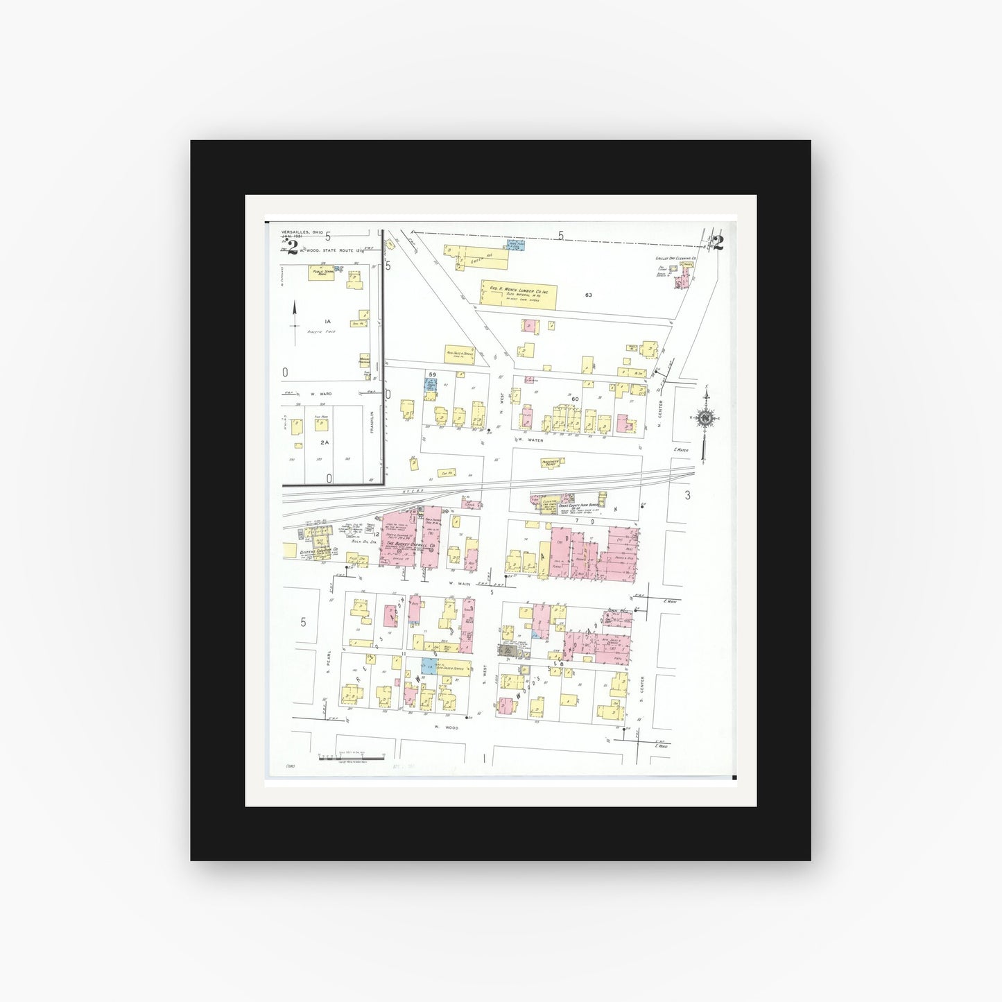 Old map wall art mockup — black gallery frame with white mat — Sanborn Fire Insurance Map from Versailles, Darke County, Ohio (1951), Sheet #0002