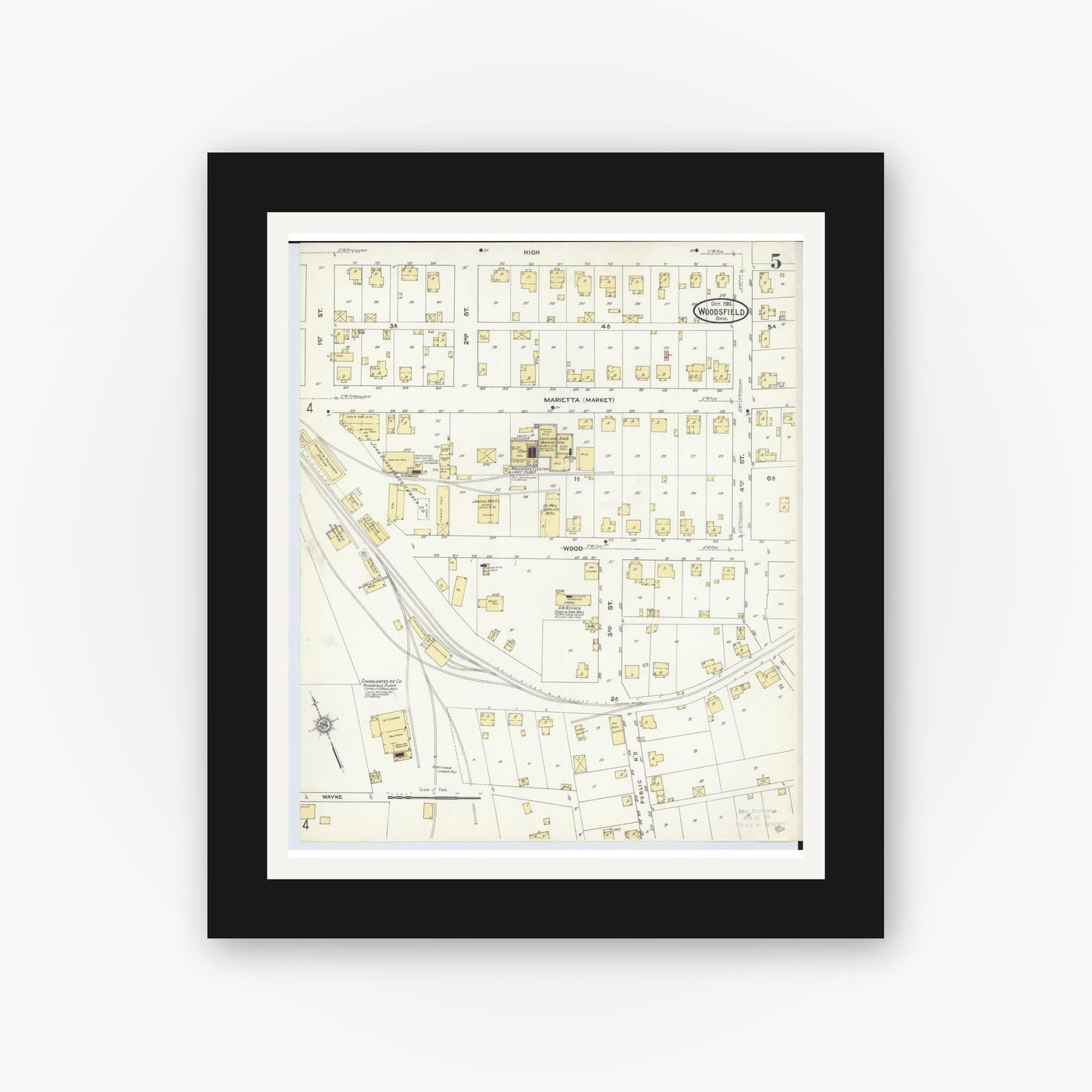Old map wall art mockup — black gallery frame with white mat — Sanborn Fire Insurance Map from Woodsfield, Monroe County, Ohio (1911), Sheet #0005