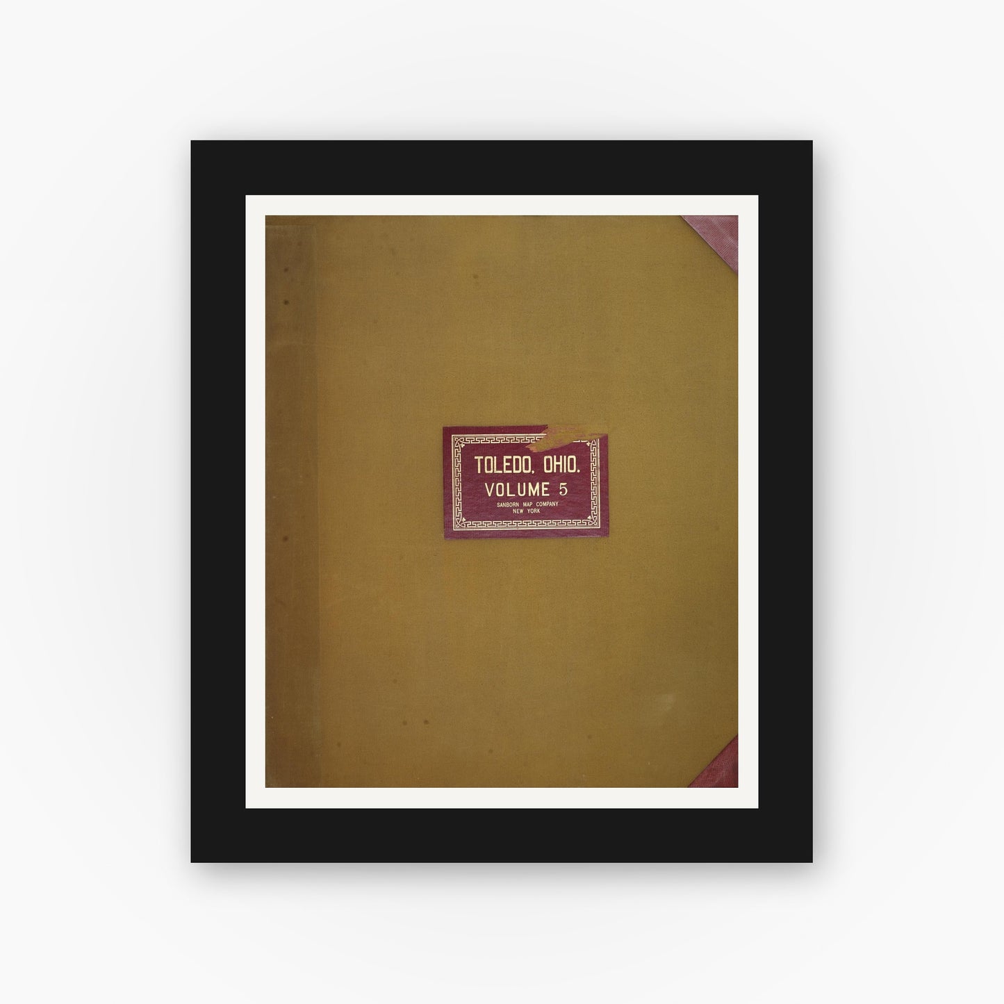 Old map wall art mockup — black gallery frame with white mat — Sanborn Fire Insurance Map from Toledo, Lucas County, Ohio (1950), Sheet #0001