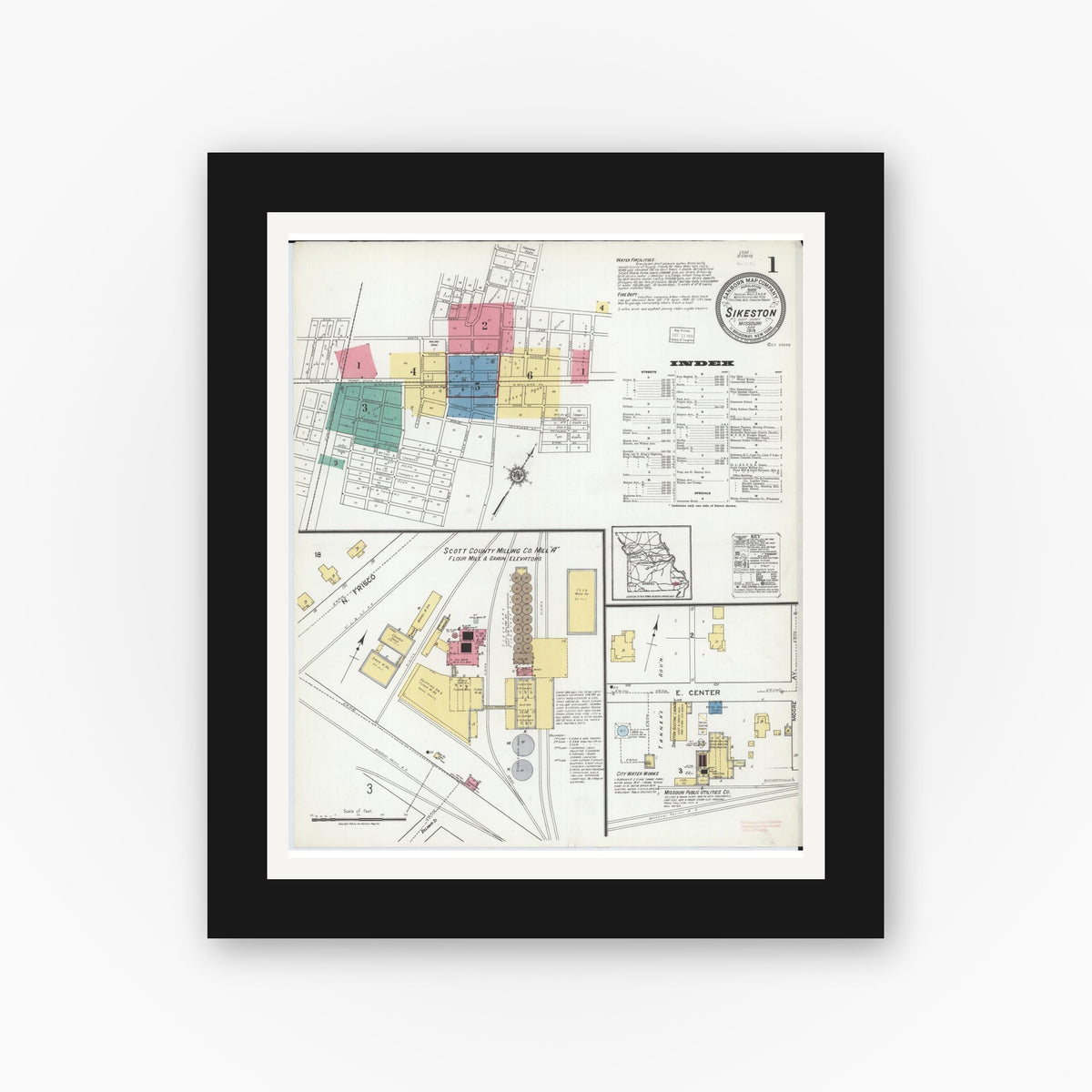 Old map wall art mockup — black gallery frame with white mat — Sanborn Fire Insurance Map from Sikeston, Scott County, Missouri (1919) - Complete Map Set