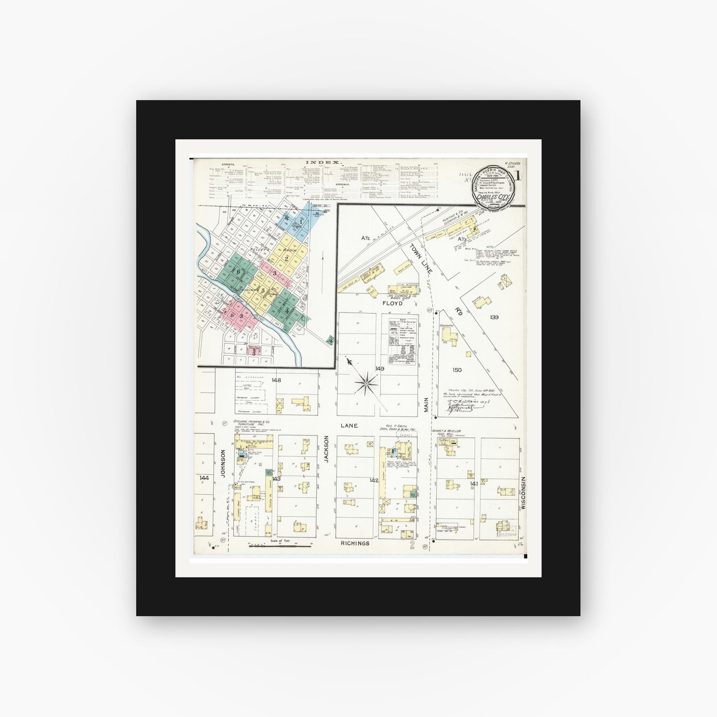 Old map wall art mockup — black gallery frame with white mat — Sanborn Fire Insurance Map from Charles City, Floyd County, Iowa (1892) — Complete Set