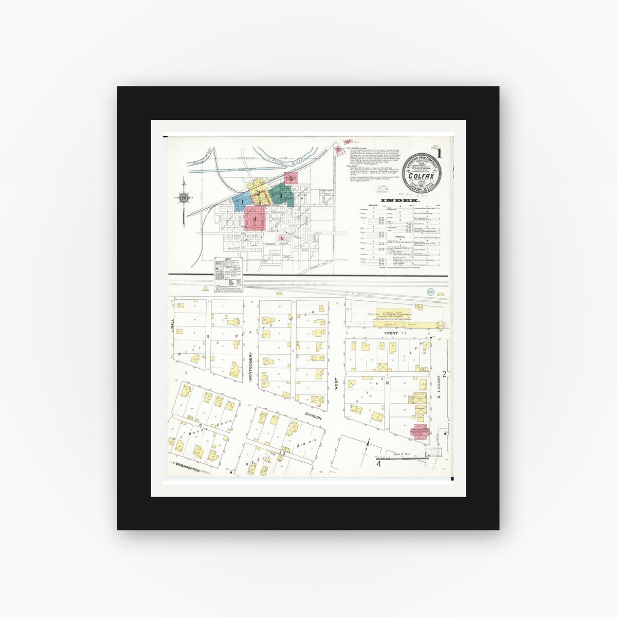 Old map wall art mockup — black gallery frame with white mat — Sanborn Fire Insurance Map from Colfax, Jasper County, Iowa (1911) — Complete Set