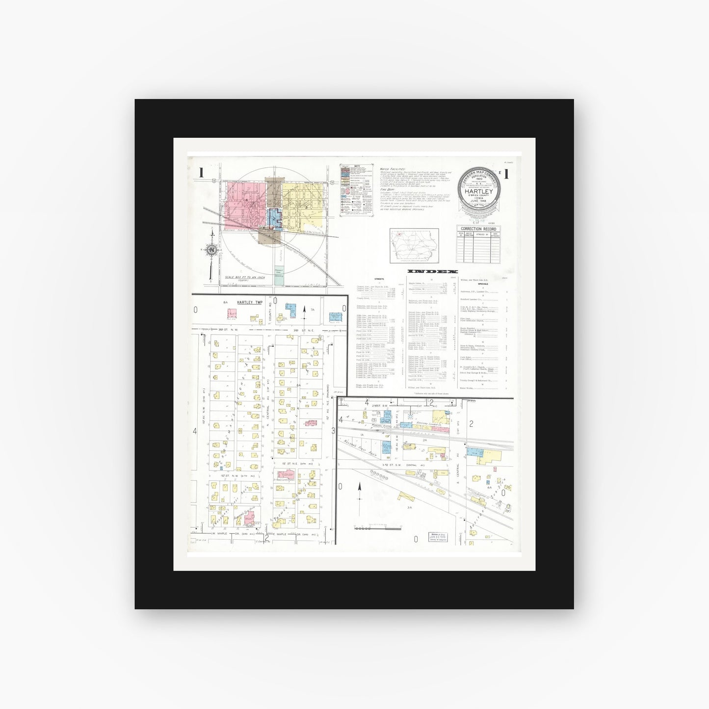 Old map wall art mockup — black gallery frame with white mat — Sanborn Fire Insurance Map from Hartley, O'Brien County, Iowa (1948) — Complete Set