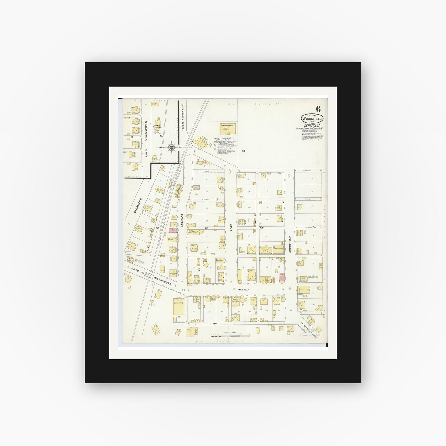 Old map wall art mockup — black gallery frame with white mat — Sanborn Fire Insurance Map from Woodsfield, Monroe County, Ohio (1911), Sheet #0006