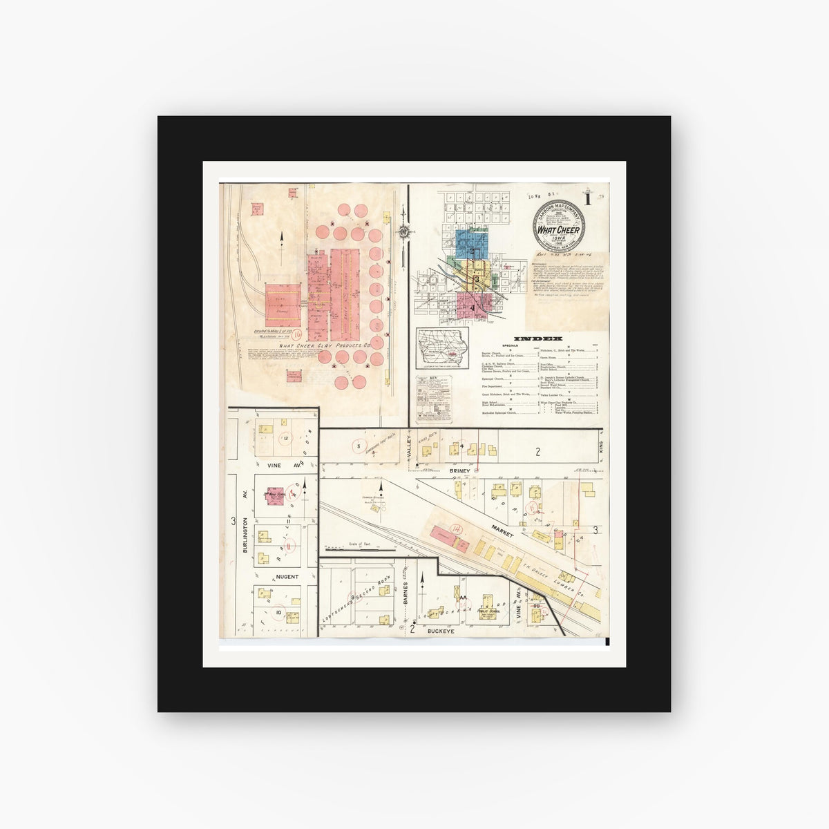 Old map wall art mockup — black gallery frame with white mat — Sanborn Fire Insurance Map from What Cheer, Keokuk County, Iowa (1933), Sheet #0001