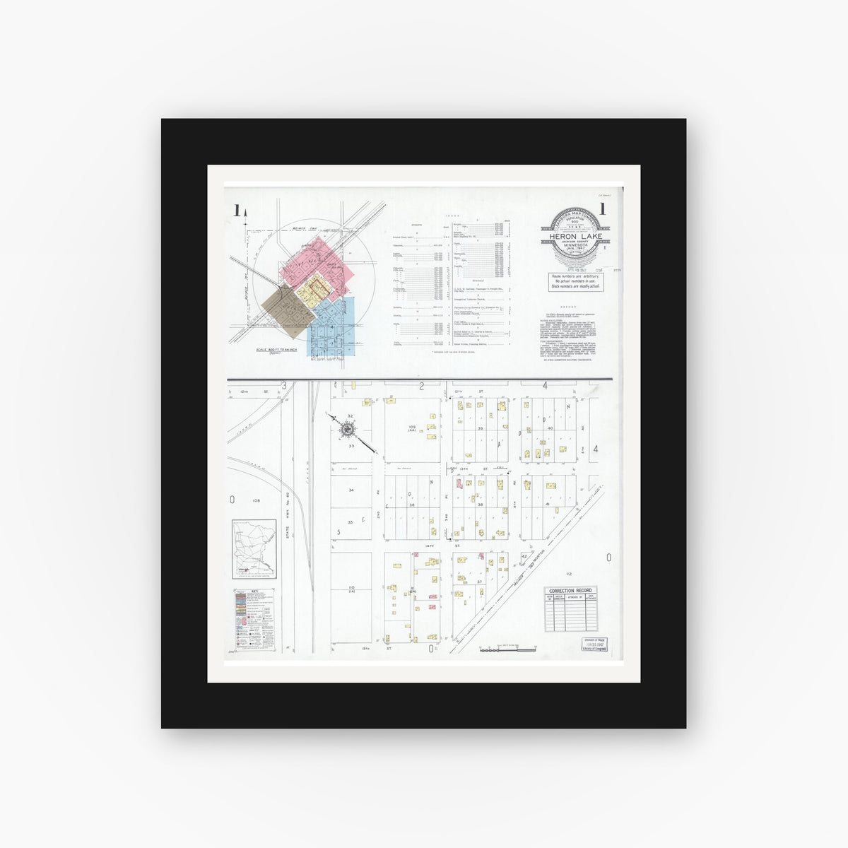 Old map wall art mockup — black gallery frame with white mat — Sanborn Fire Insurance Map from Heron Lake, Jackson County, Minnesota (1947), Sheet #0001