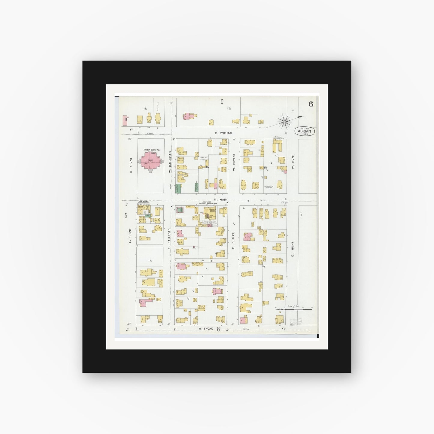 Old map wall art mockup — black gallery frame with white mat — Sanborn Fire Insurance Map from Adrian, Lenawee County, Michigan (1899), Sheet #0006
