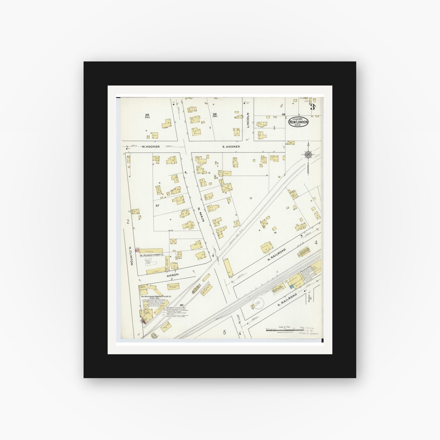 Old map wall art mockup — black gallery frame with white mat — Sanborn Fire Insurance Map from New London, Huron County, Ohio (1921), Sheet #0003