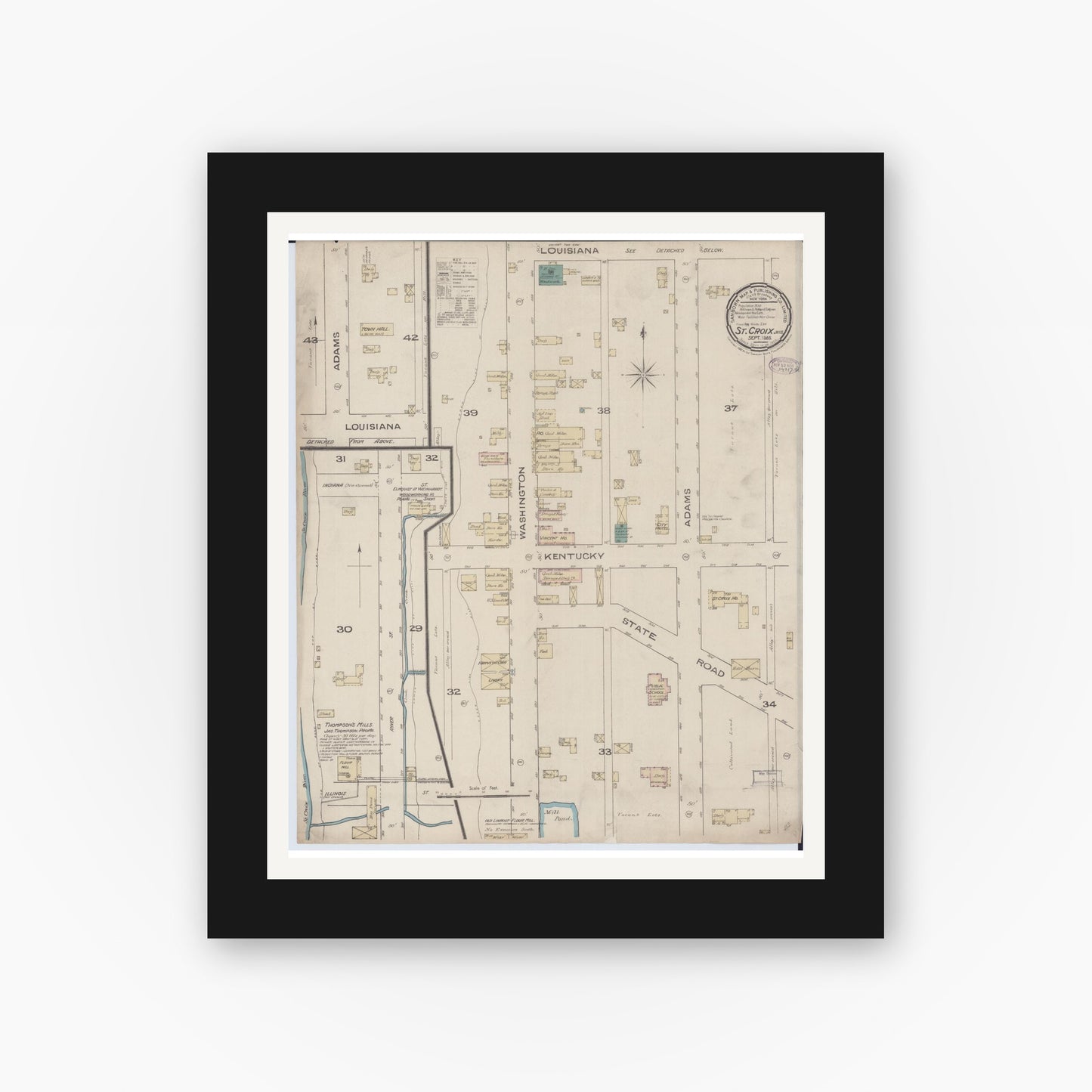 Old map wall art mockup — black gallery frame with white mat — Sanborn Fire Insurance Map from Saint Croix Falls, Polk County, Wisconsin (1885), Sheet #0001
