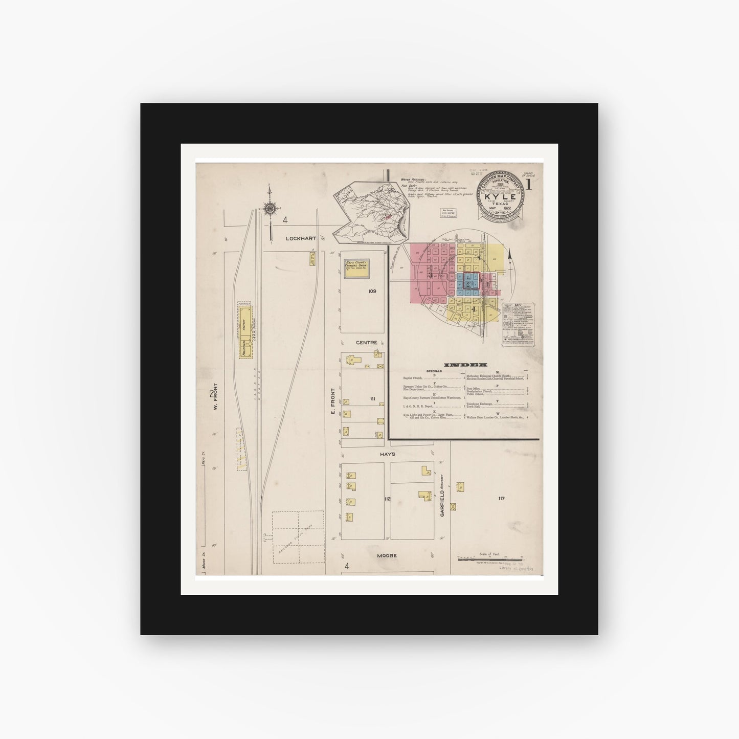 Old map wall art mockup — black gallery frame with white mat — Sanborn Fire Insurance Map from Kyle, Hays County, Texas (1922), Sheet #0001