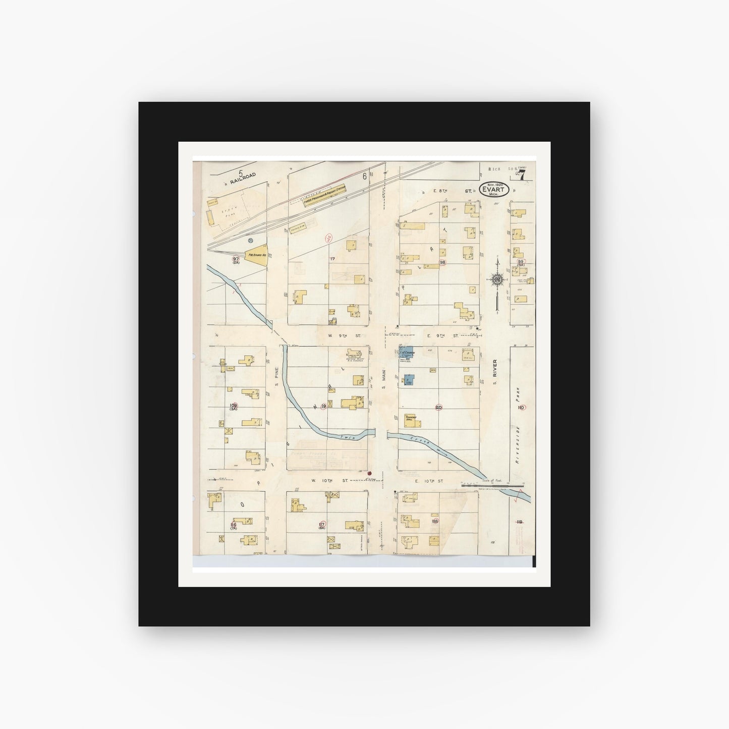 Old map wall art mockup — black gallery frame with white mat — Sanborn Fire Insurance Map from Evart, Osceola County, Michigan (1942), Sheet #0007