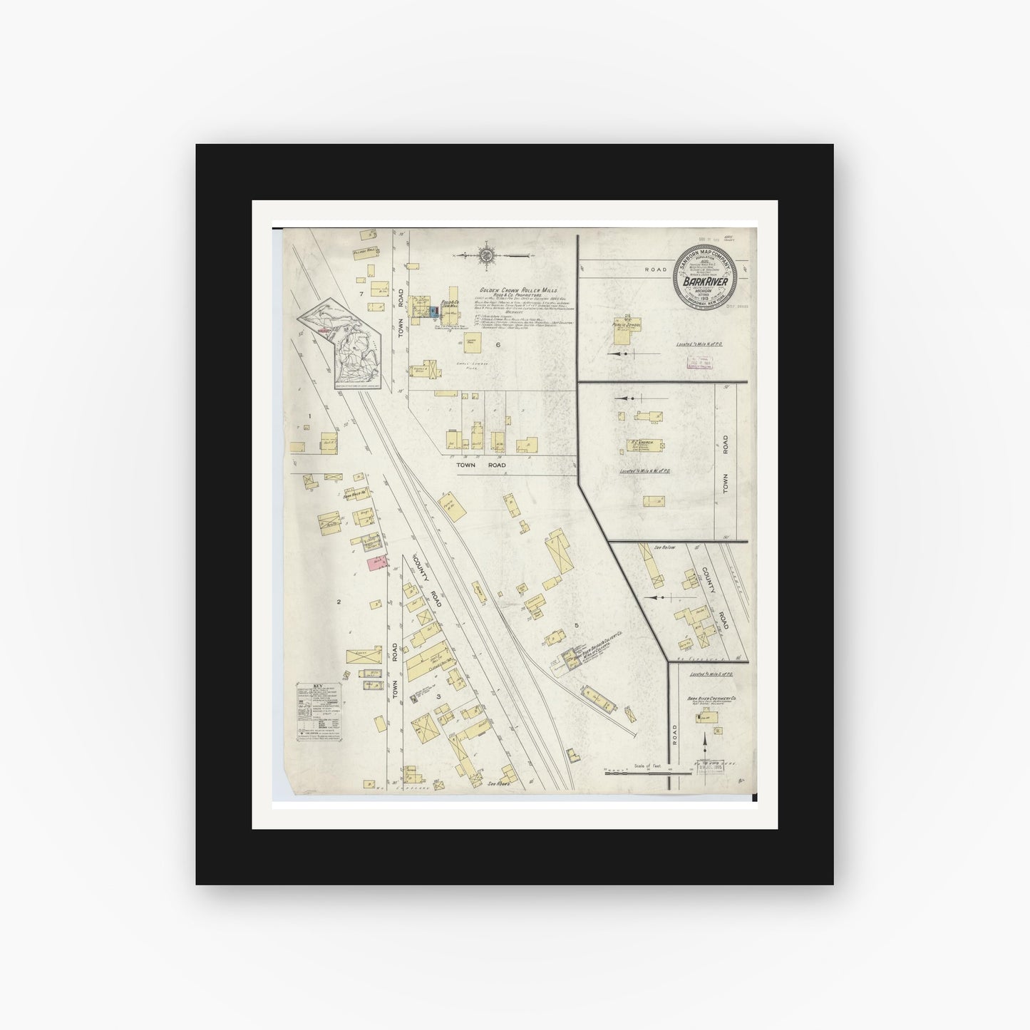 Old map wall art mockup — black gallery frame with white mat — Sanborn Fire Insurance Map from Bark River, Delta County, Michigan (1913), Sheet #0001