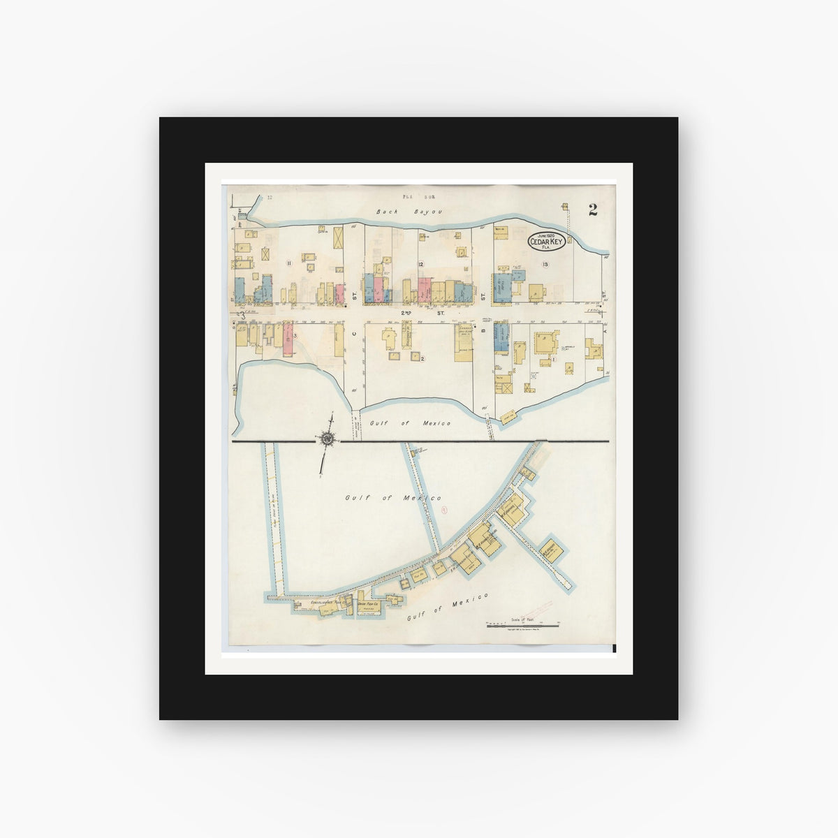 Old map wall art mockup — black gallery frame with white mat — Sanborn Fire Insurance Map from Cedar Key, Levy County, Florida (1933), Sheet #0002