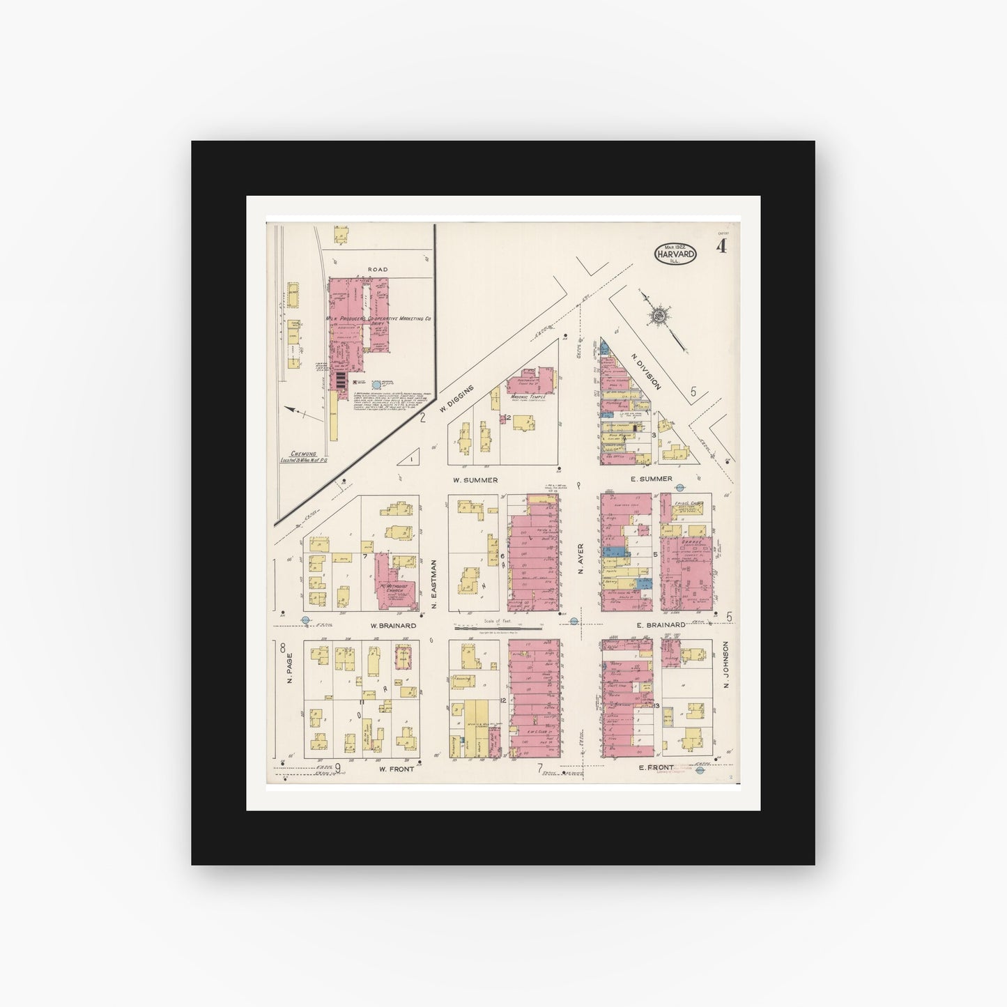 Old map wall art mockup — black gallery frame with white mat — Sanborn Fire Insurance Map from Harvard, McHenry County, Illinois (1922), Sheet #0004